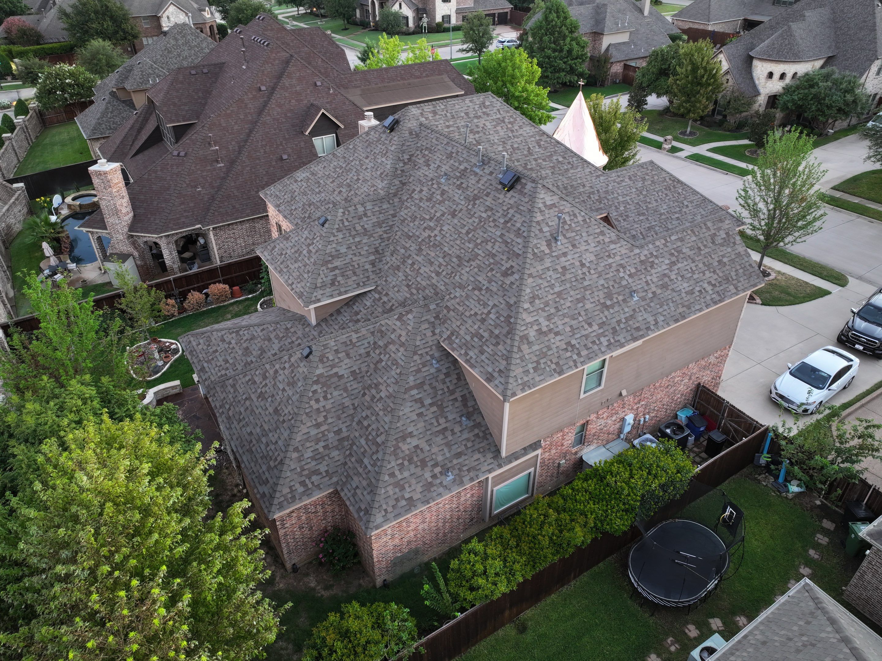 Installing Custom copper turret and Malarkey Vista Class 4 shingles Hail Damage Upgrade by Becker Roofing and Exteriors