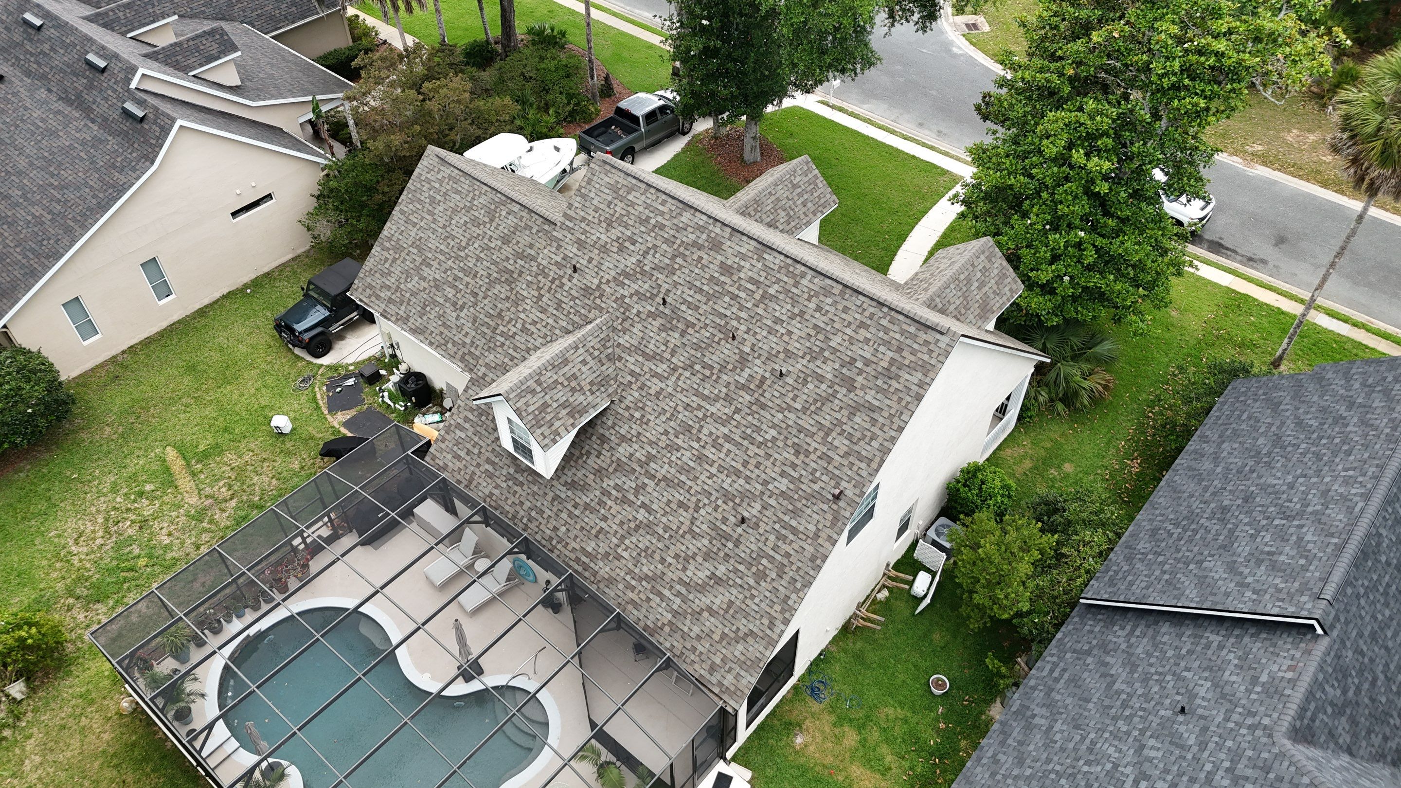 Full Residential Roofing Installation for Multi-Gabled Flagler Beach Home by Trinity Restoration and Roofing LLC