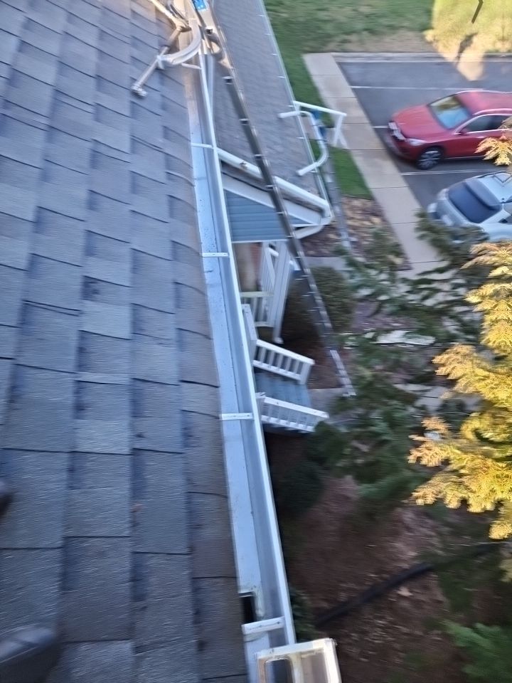 Gutter Cleaning using water by Power Wash Masters LLC