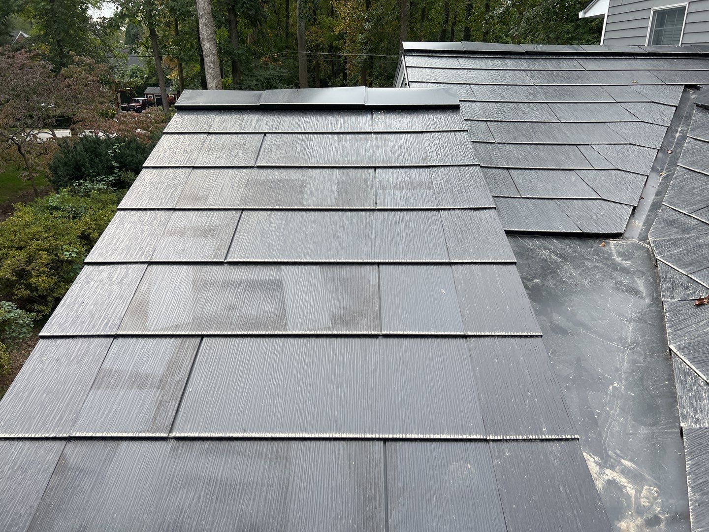 Tesla Solar Roof Replacement using Tesla Solar Roof V3 Tiles by American Home Contractors