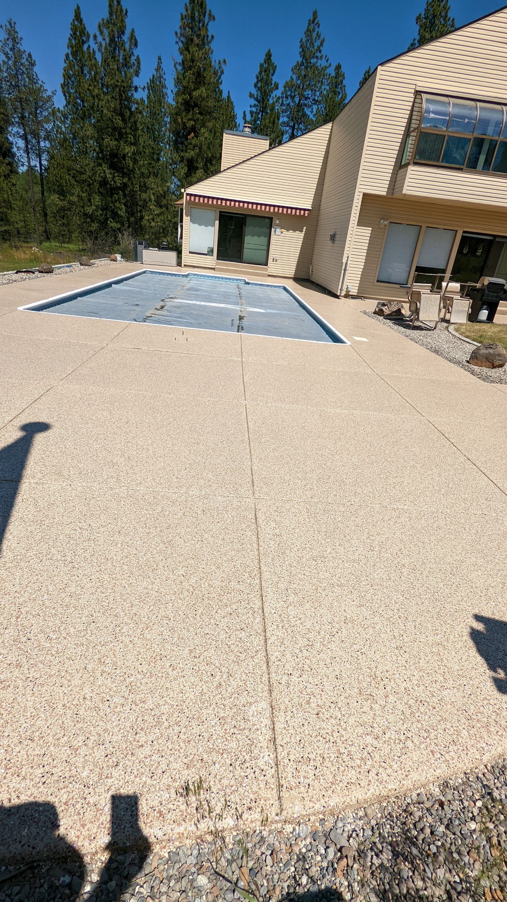 Garage Transformation using Domino for Garage and Pecan for Pool Deck by Croc Coatings, LLC