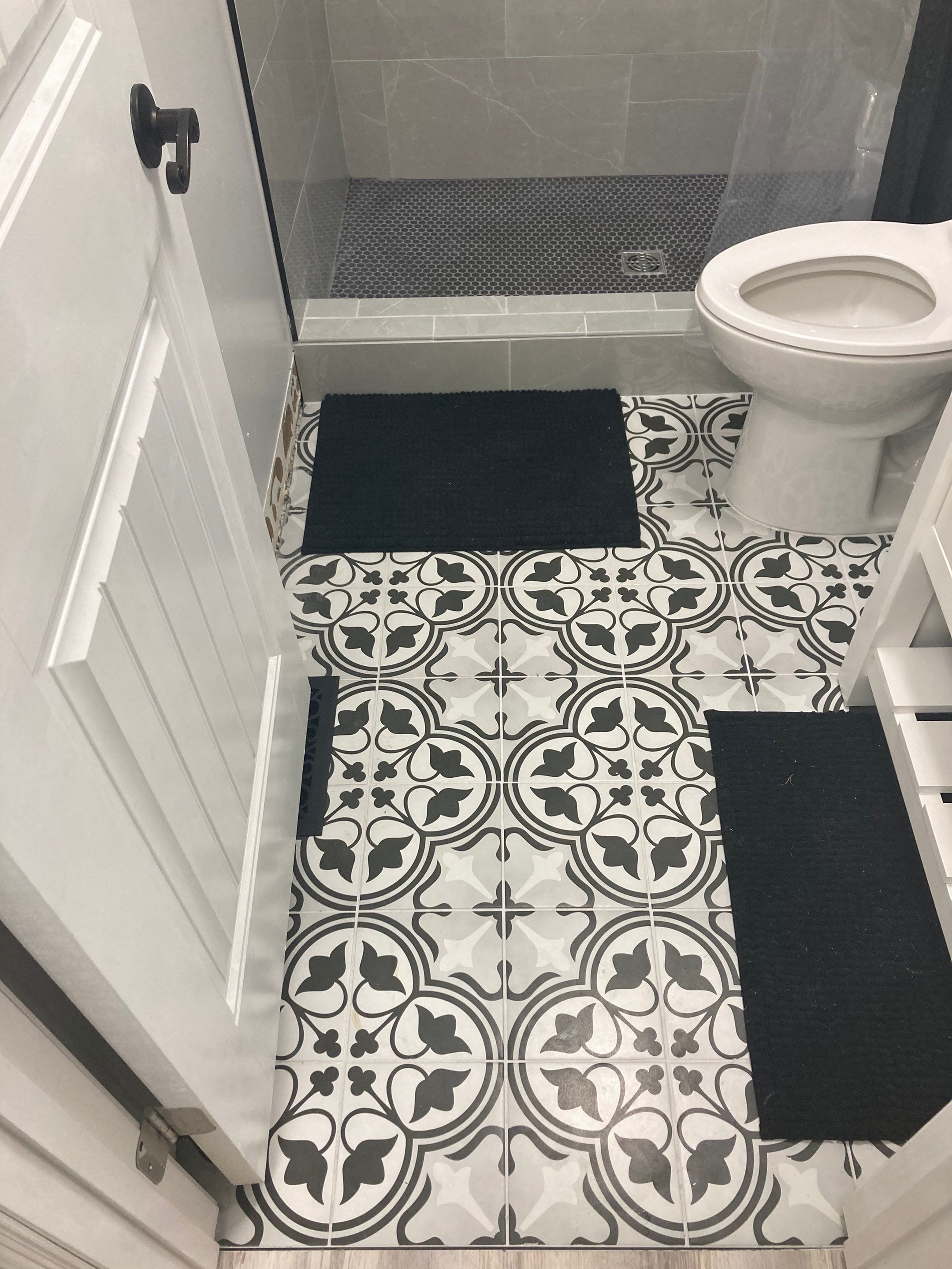 New custom tile shower and bathroom floor! by Footprints Floors of Nashville