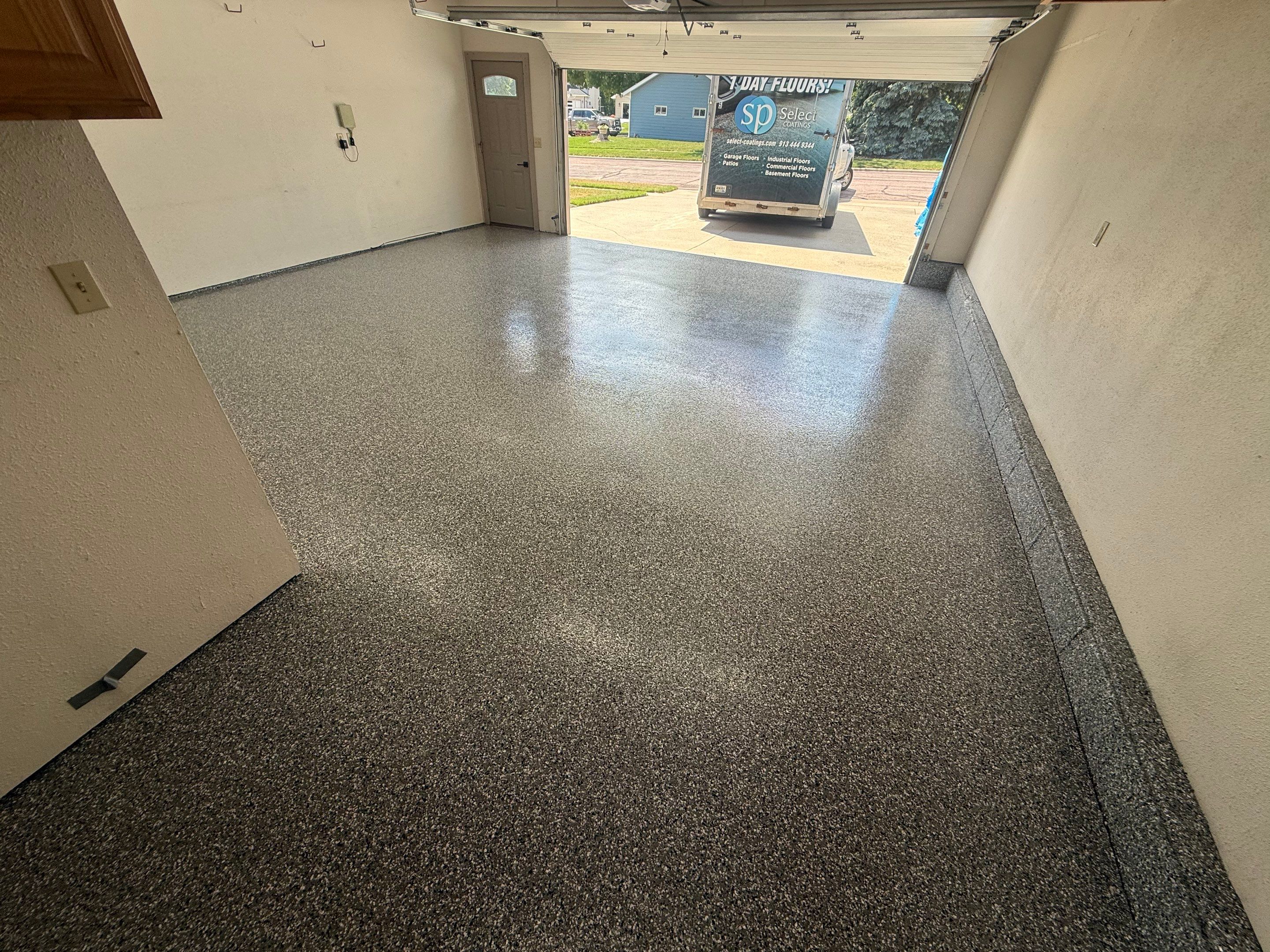 Smoke Flake Garage Floor Coating in Dell Rapids by Select Painting, Coatings & Garage Cabinets