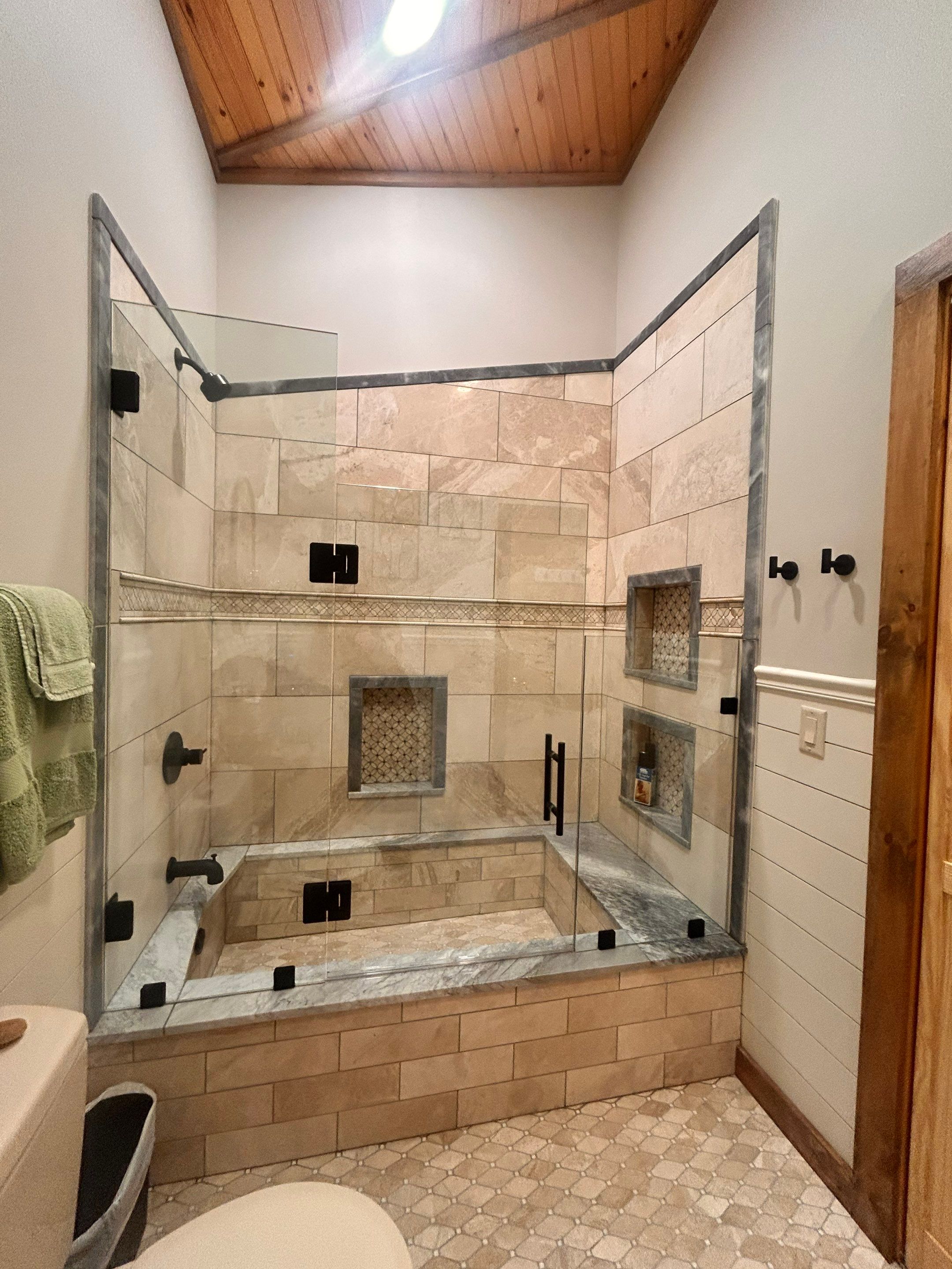 Frameless Tub Enclosure using Tempered Shower Glass by Cheshire Glass Company