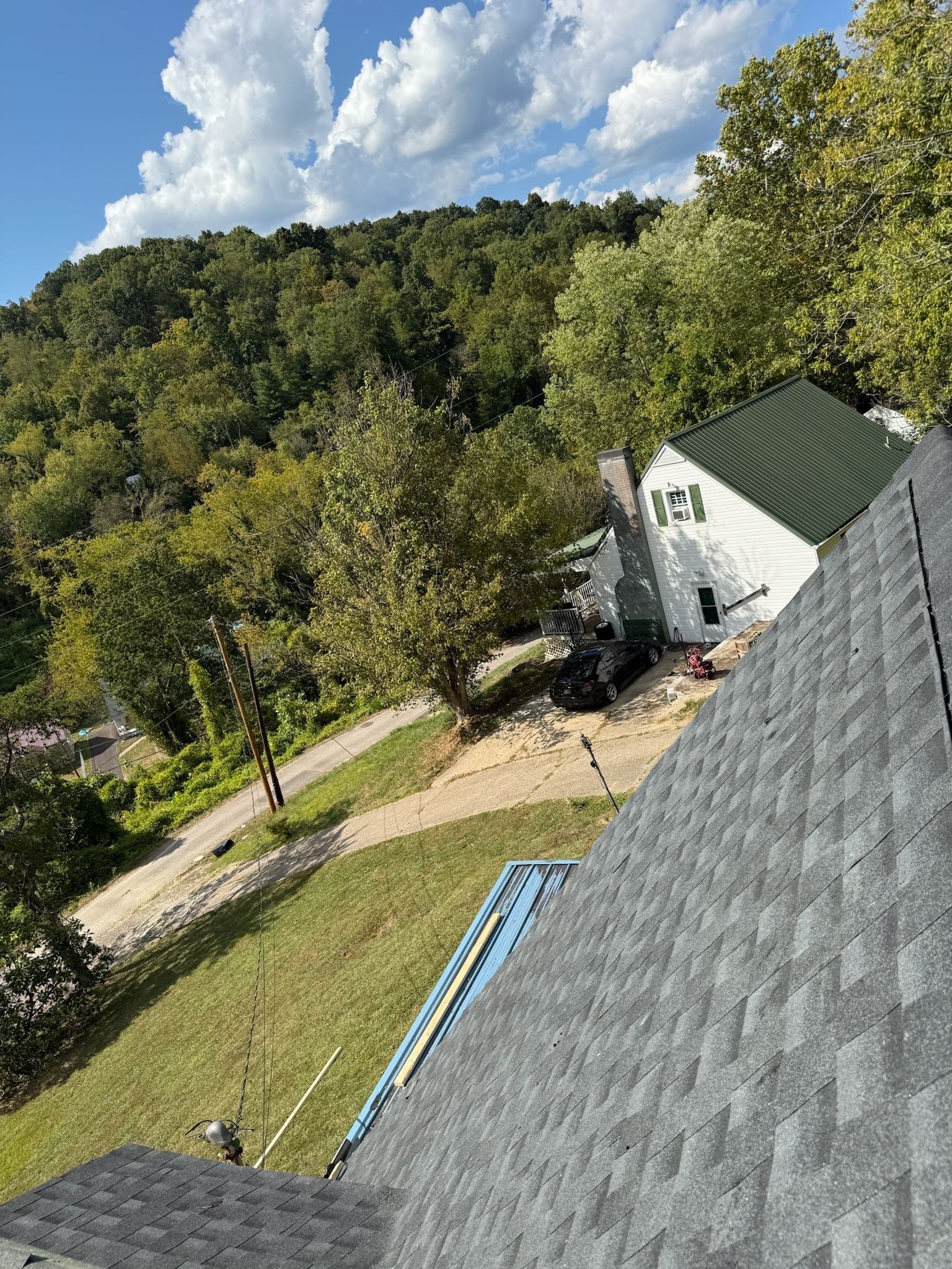 Residential Roofing Installation using GAF Timberline HDZ Charcoal by Rainstoppers Roofing