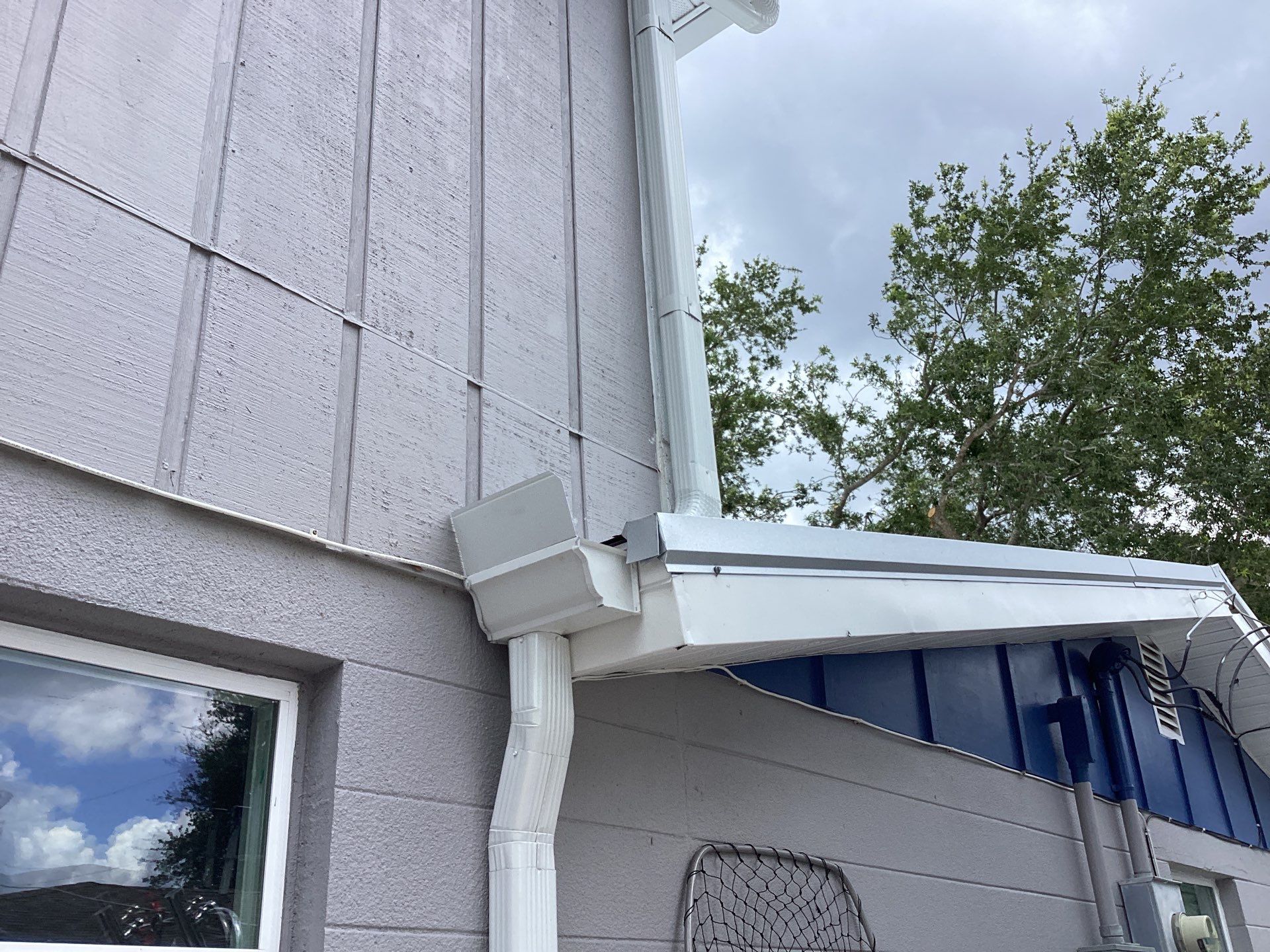 White K Style Seamless Gutters using 3X4 Elbow Downspout in Sarasota FL by Gutter Professors