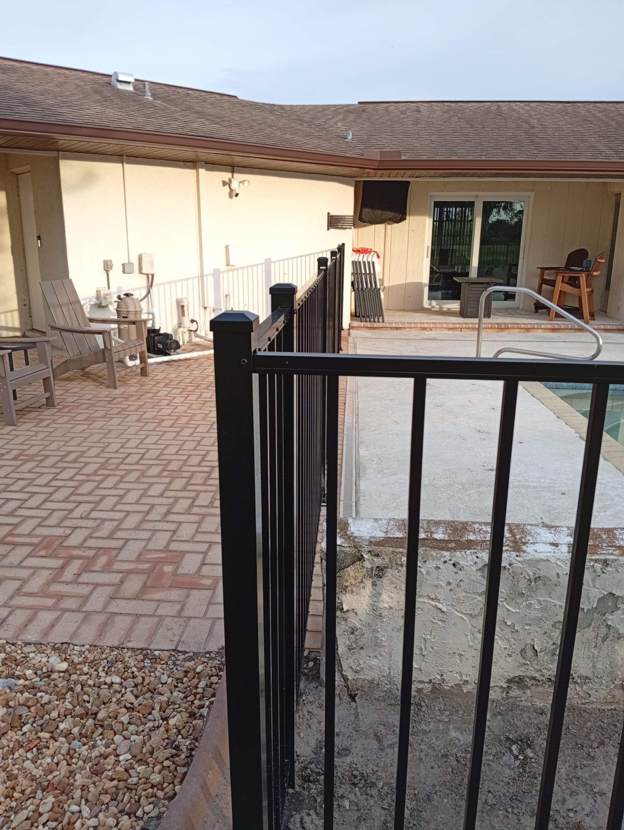 Black Aluminum Pool Safety Fence Installation in Punta Gorda by True Fence LLC
