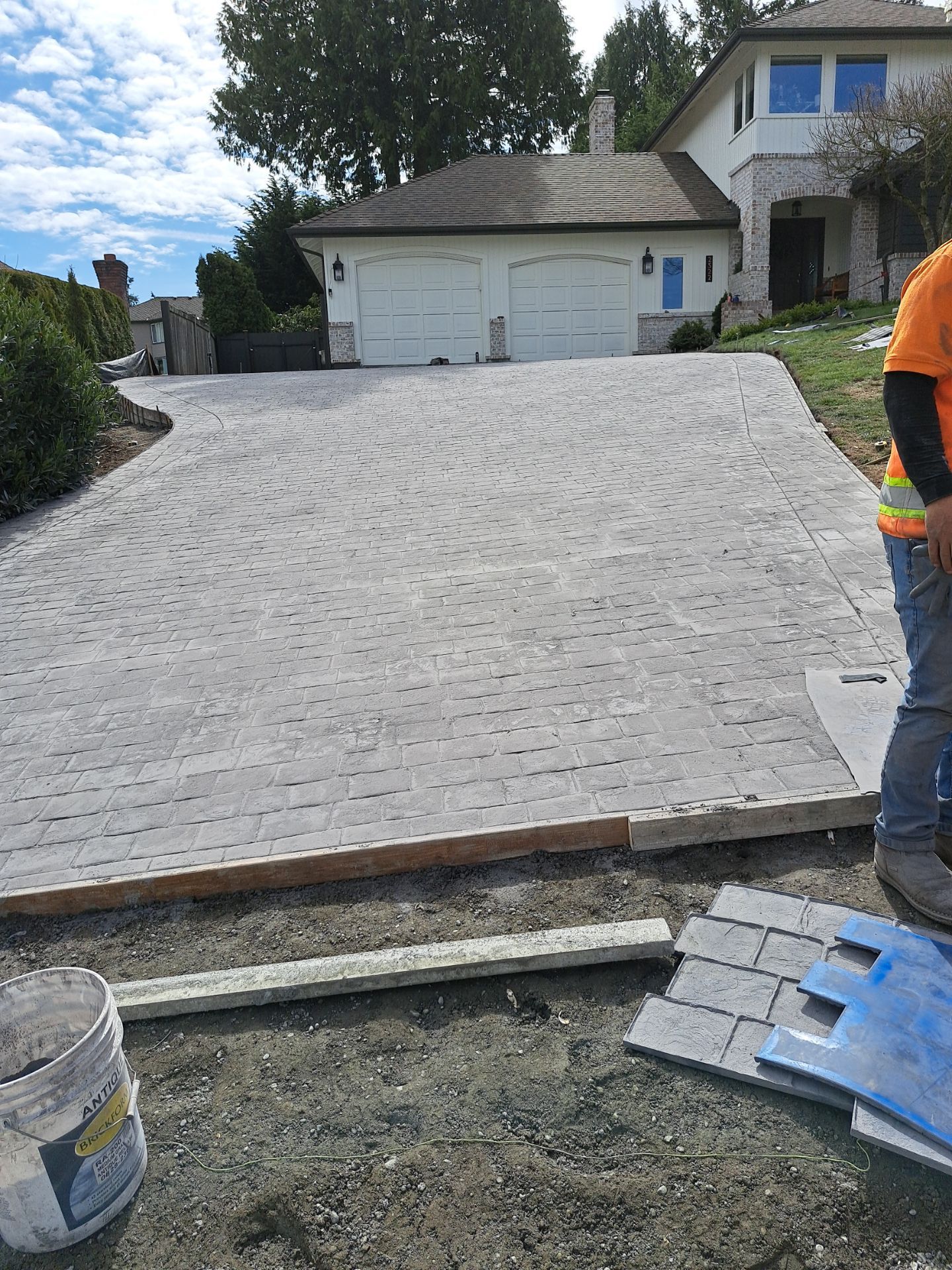 John | Stamped Concrete Driveway Makeover by Jireh Asphalt & Concrete Inc 