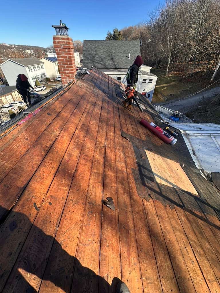 Full Roof Replacement with Skylight Removal for Winter Protection by Sensible Home Solutions