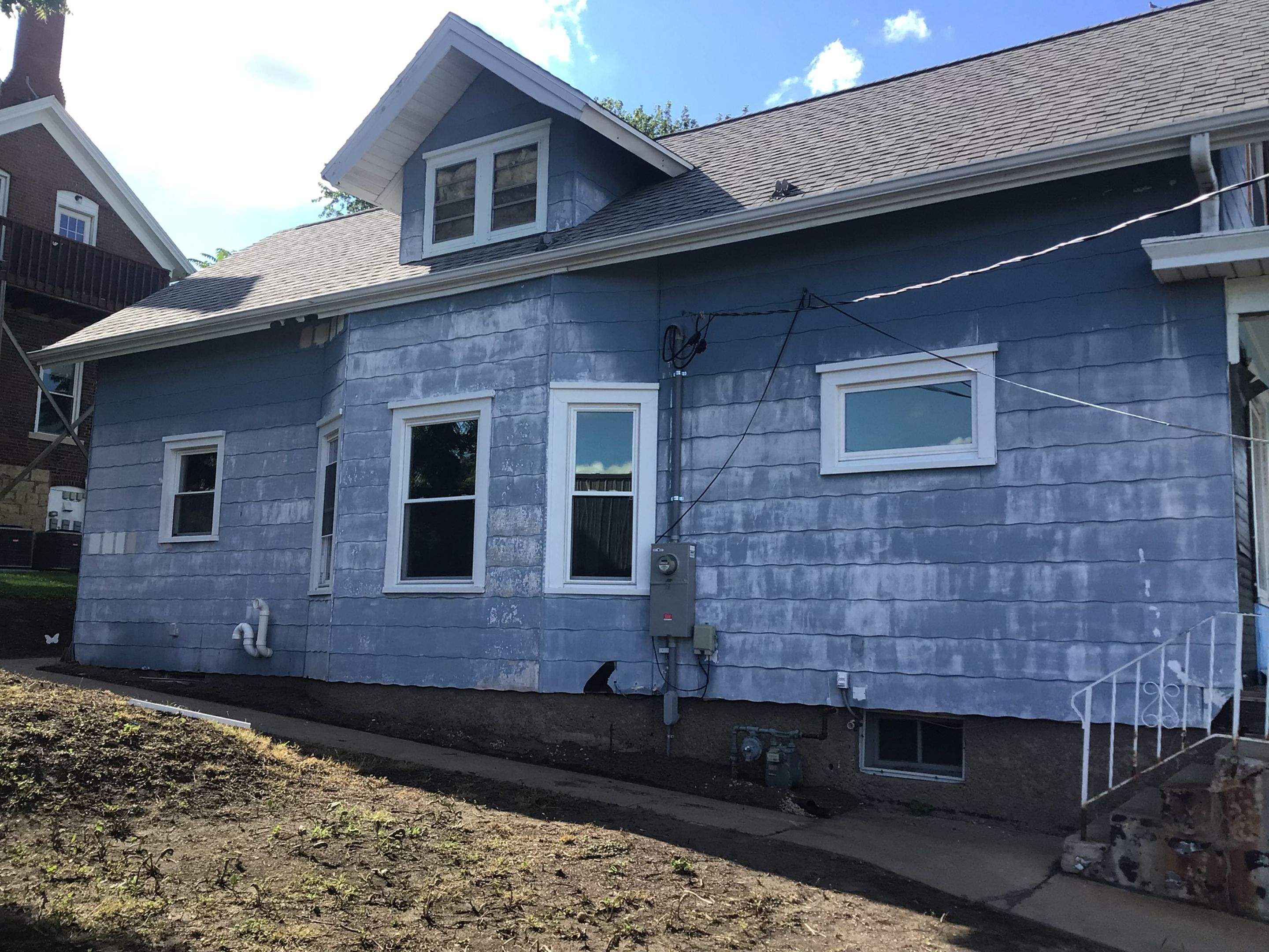 Fiber/Cement Board Exterior Repaint by Grandview Painting