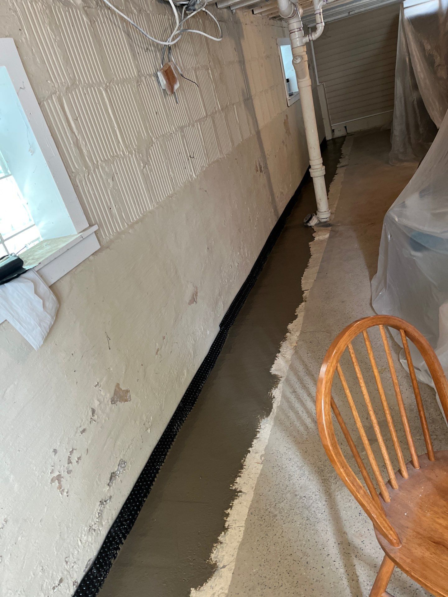 Berwyn- Interior Drain Tile System by Area Wide Waterproofing