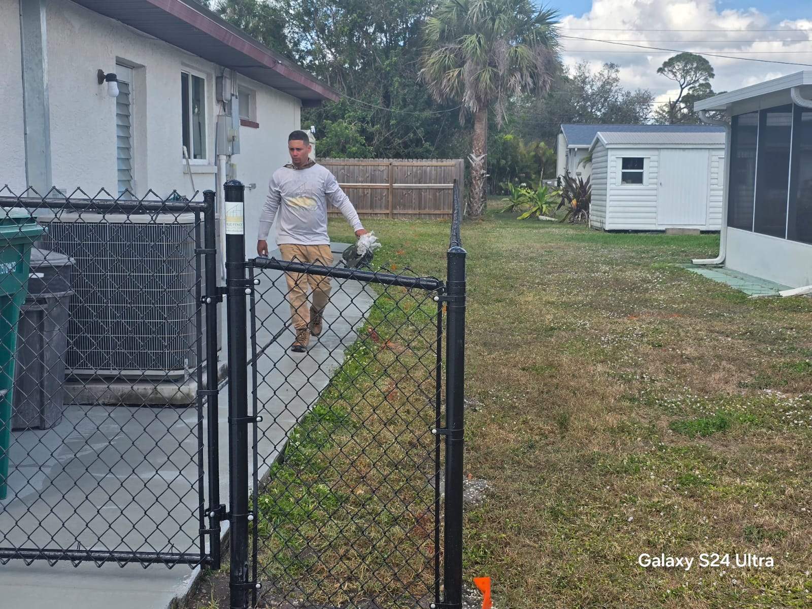 Black Chain Link Fence Installation for Port Charlotte Residence by True Fence LLC