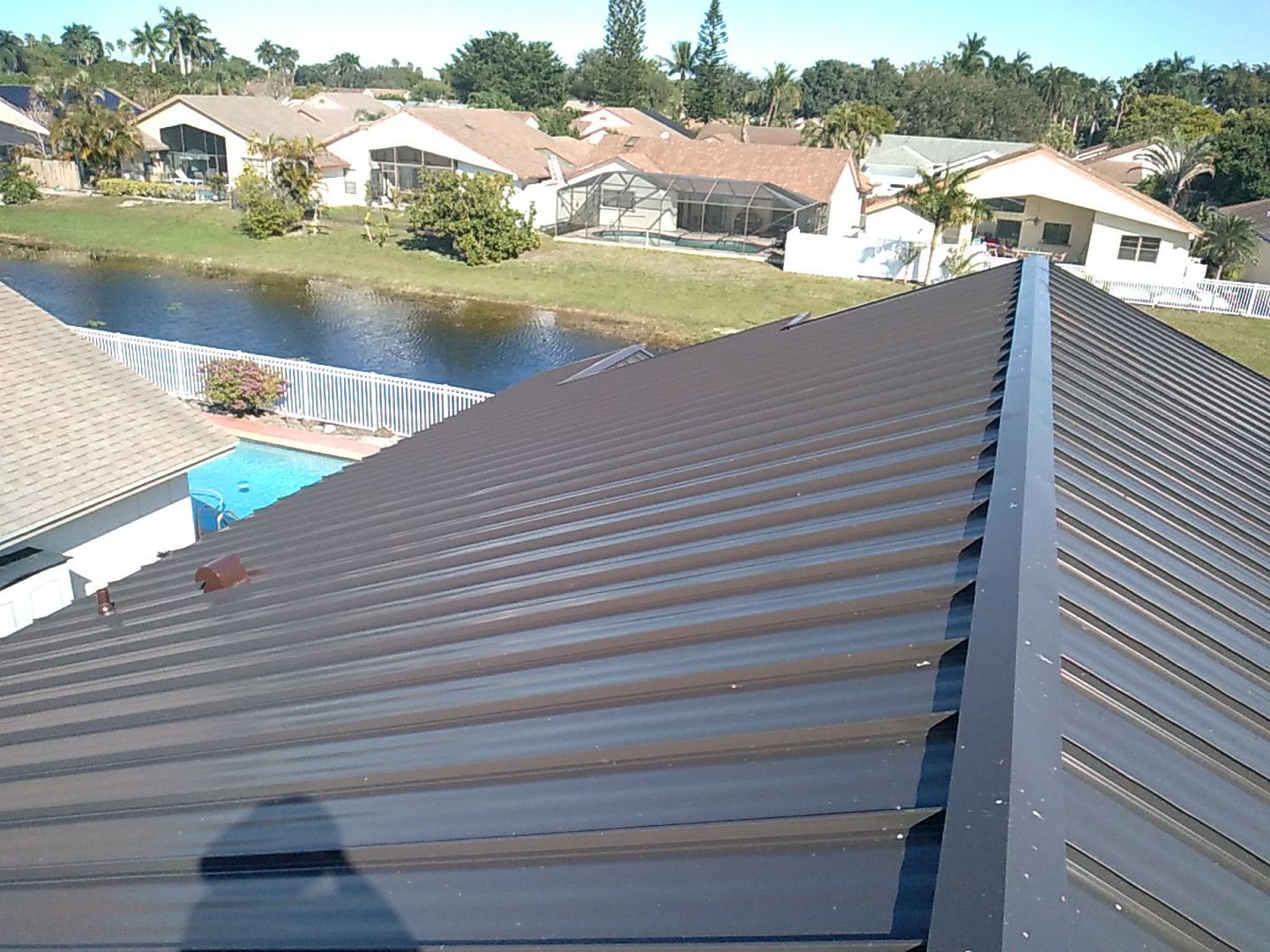 Residential Roofing Installation using 1" Nail strip metal roof by BLUES BROTHERS ROOFING