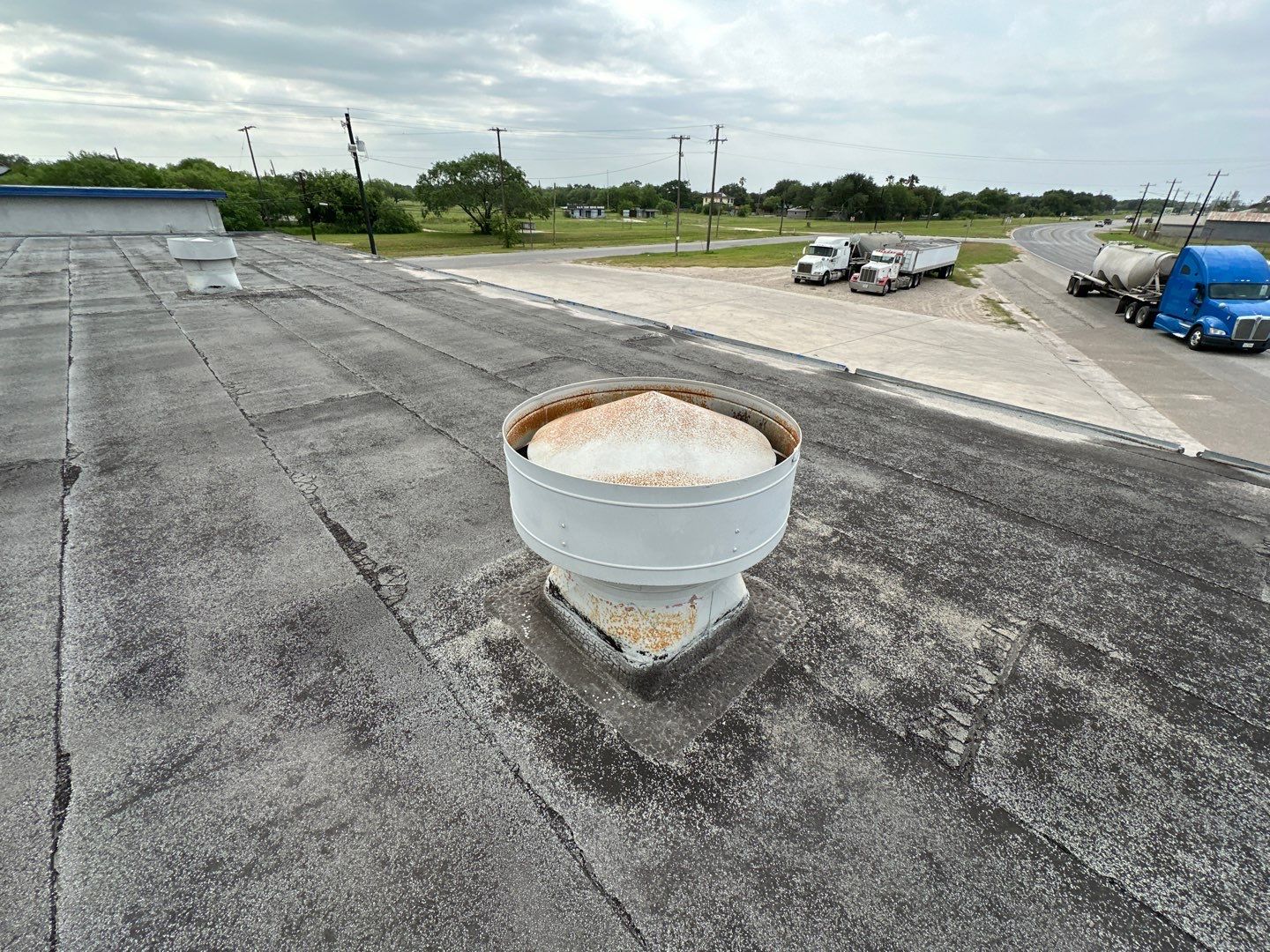Commercial Silcone Roof Repair using Silcone Coating by Galvan Roofing and Construction
