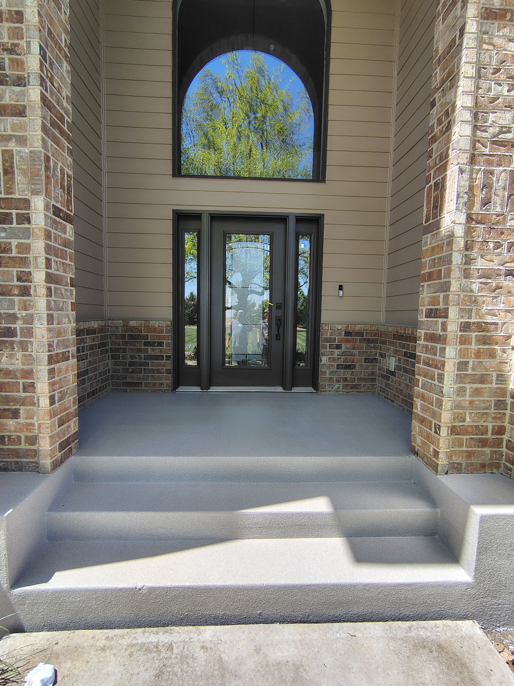 Front Porch Concrete Coating and Restoration in Harrisburg by Select Painting, Coatings & Garage Cabinets