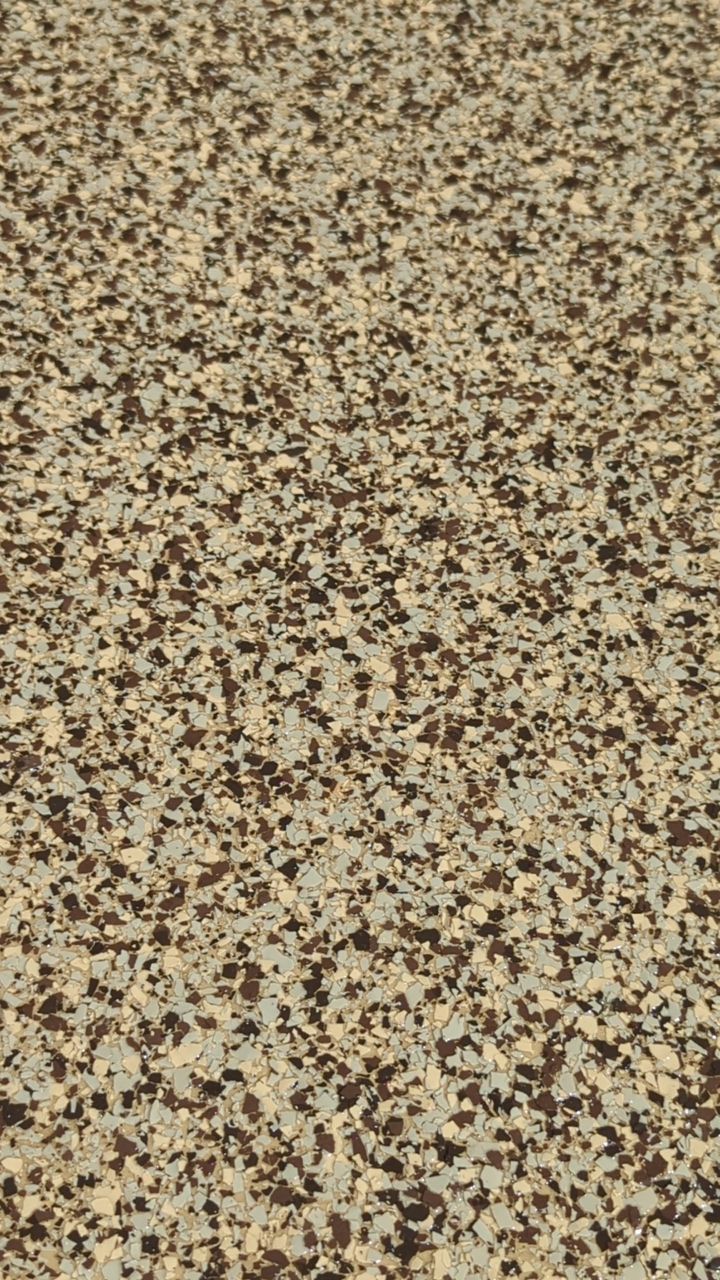 Garage using Cordwood by Select Painting, Coatings & Garage Cabinets