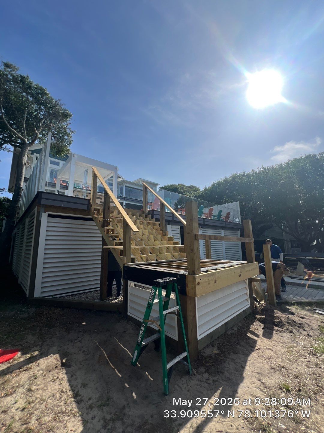 Oak Island Exterior Staircase Rebuild with Trex Composite Decking by RGR Construction and Roofing, LLC
