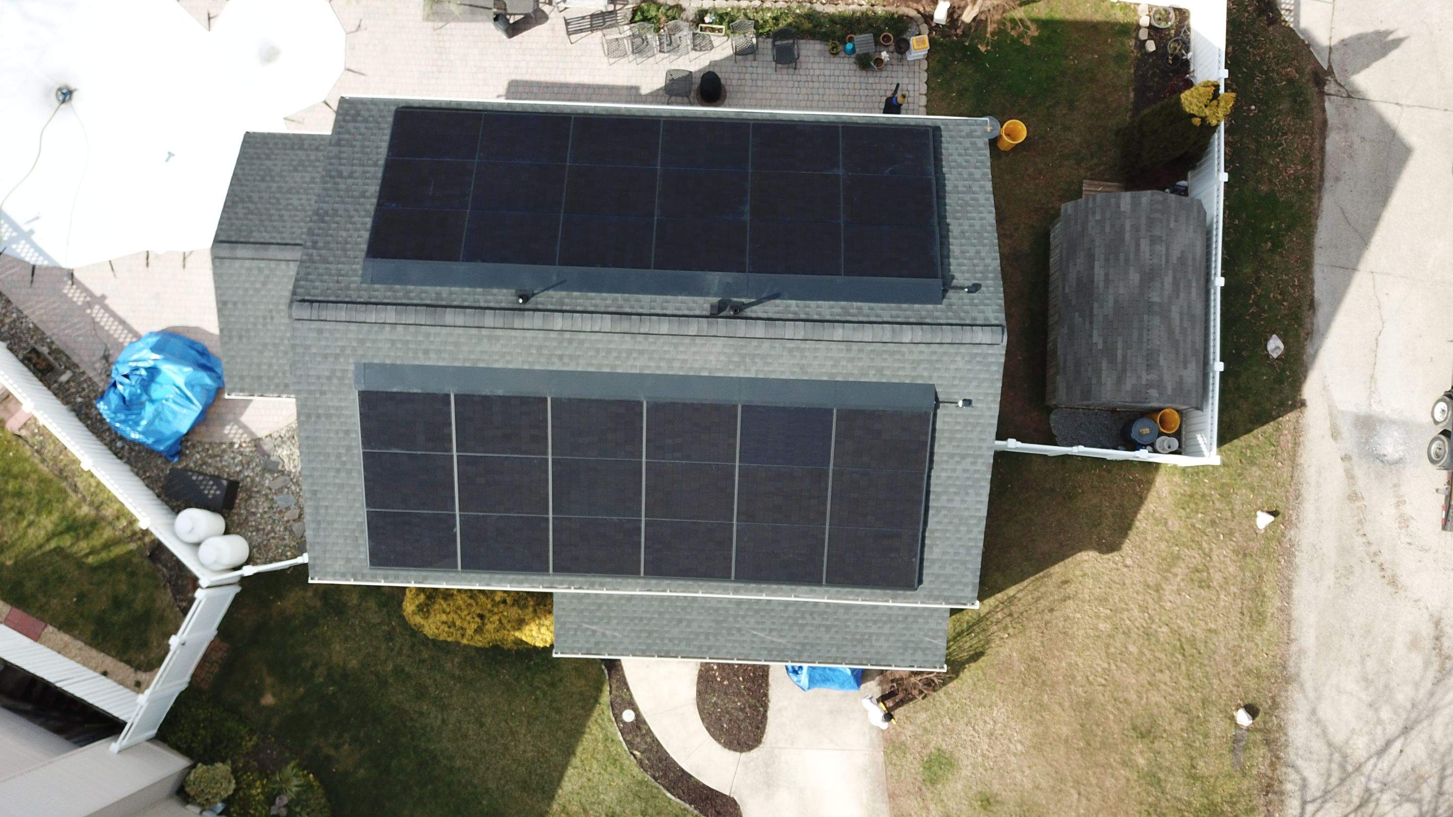 Roof Replacement with GAF Decotech integrated solar panels by American Home Contractors