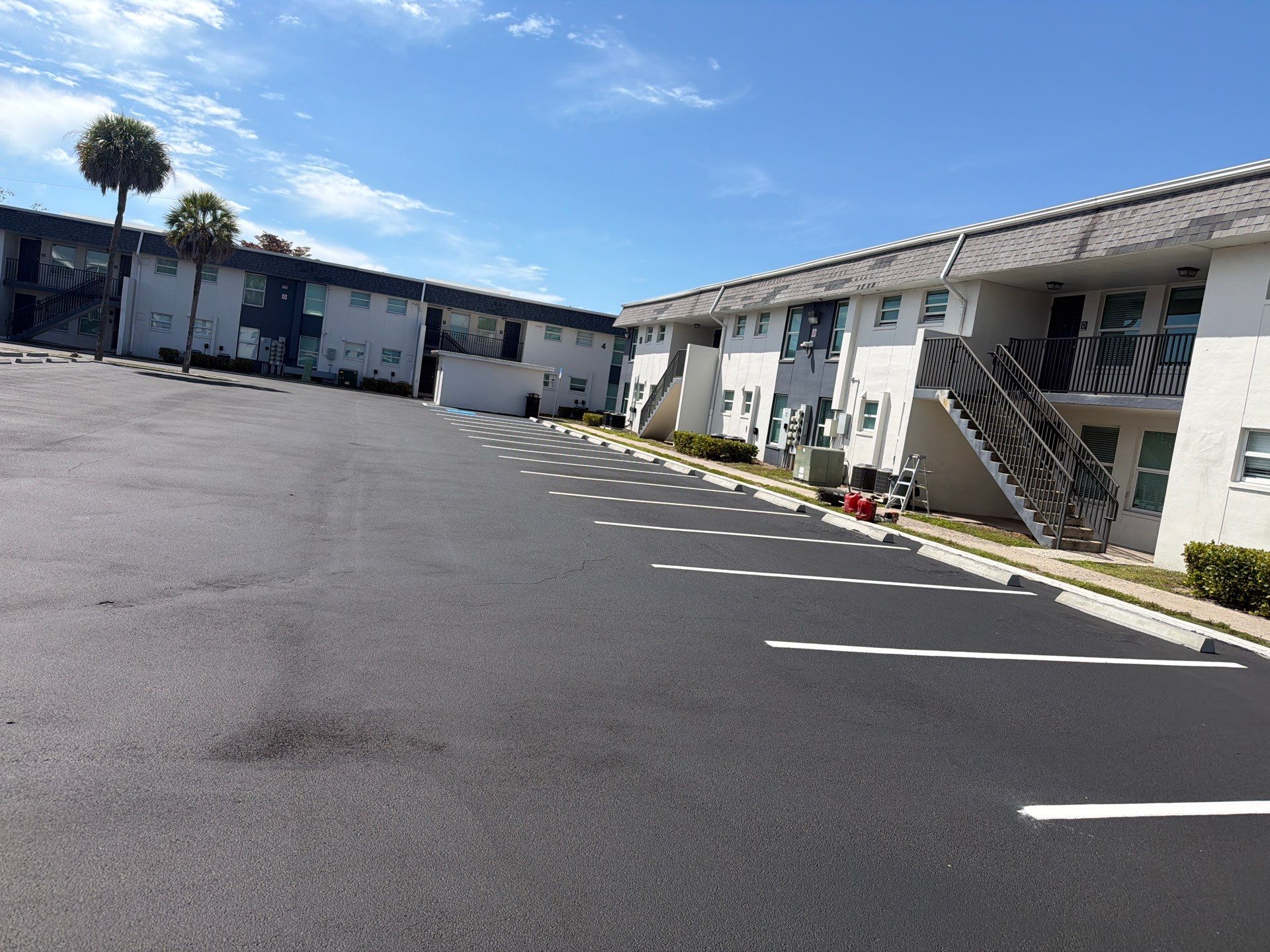 Fort Myers Apartment Complex Asphalt Sealcoating and Line Striping by Everline Coatings & Services - Southwest FL