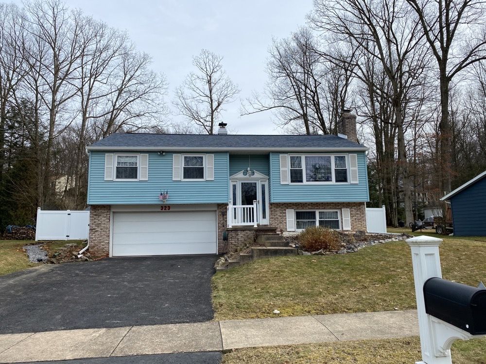 A roof replacement in State College, PA using Owens Corning shingles. by Starway Roof Systems