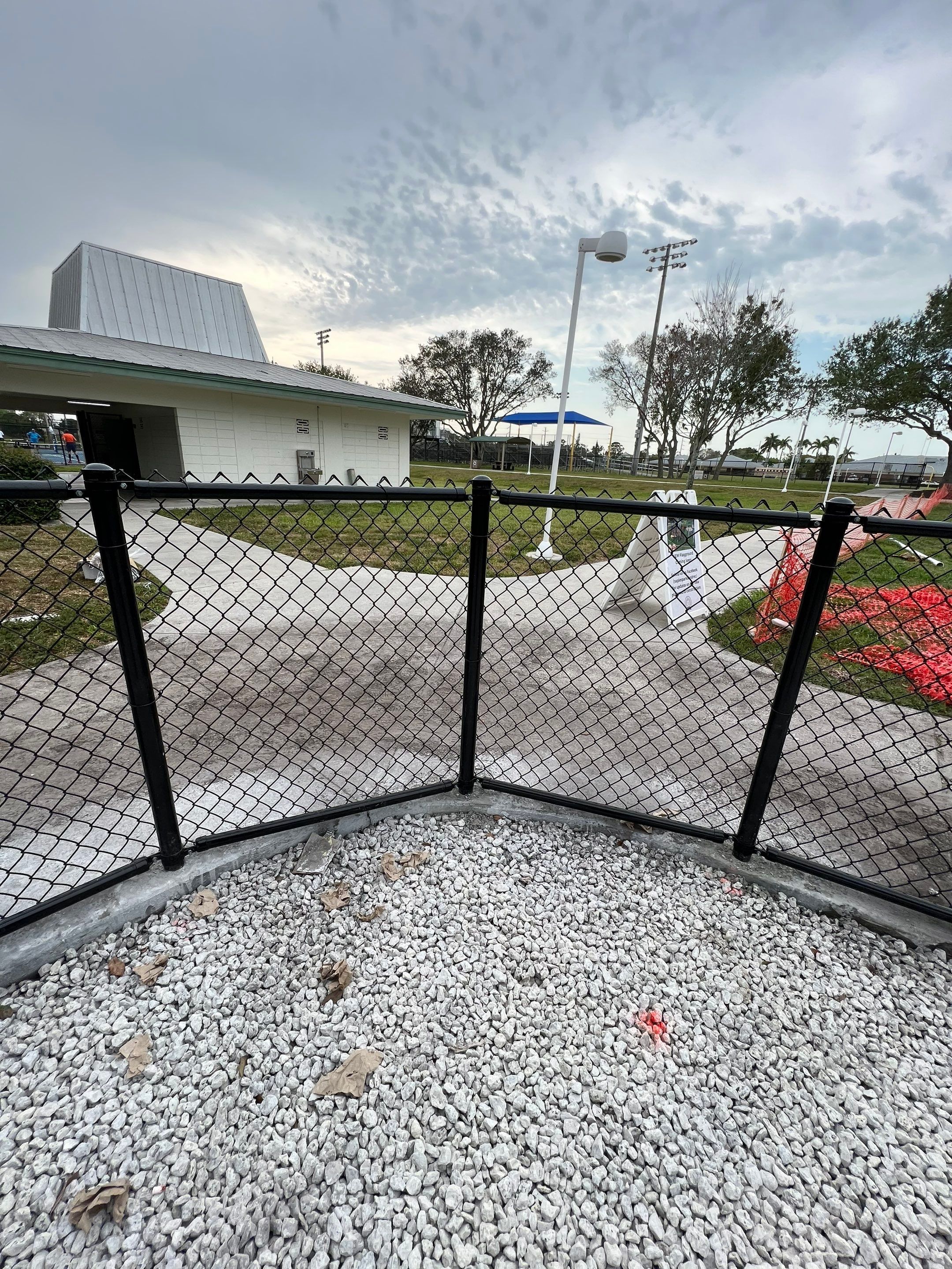 Vinyl Coated Chain-link fence for the City of Naples around Fleischmann Park Playground.  by Asap fence and gates, LLC