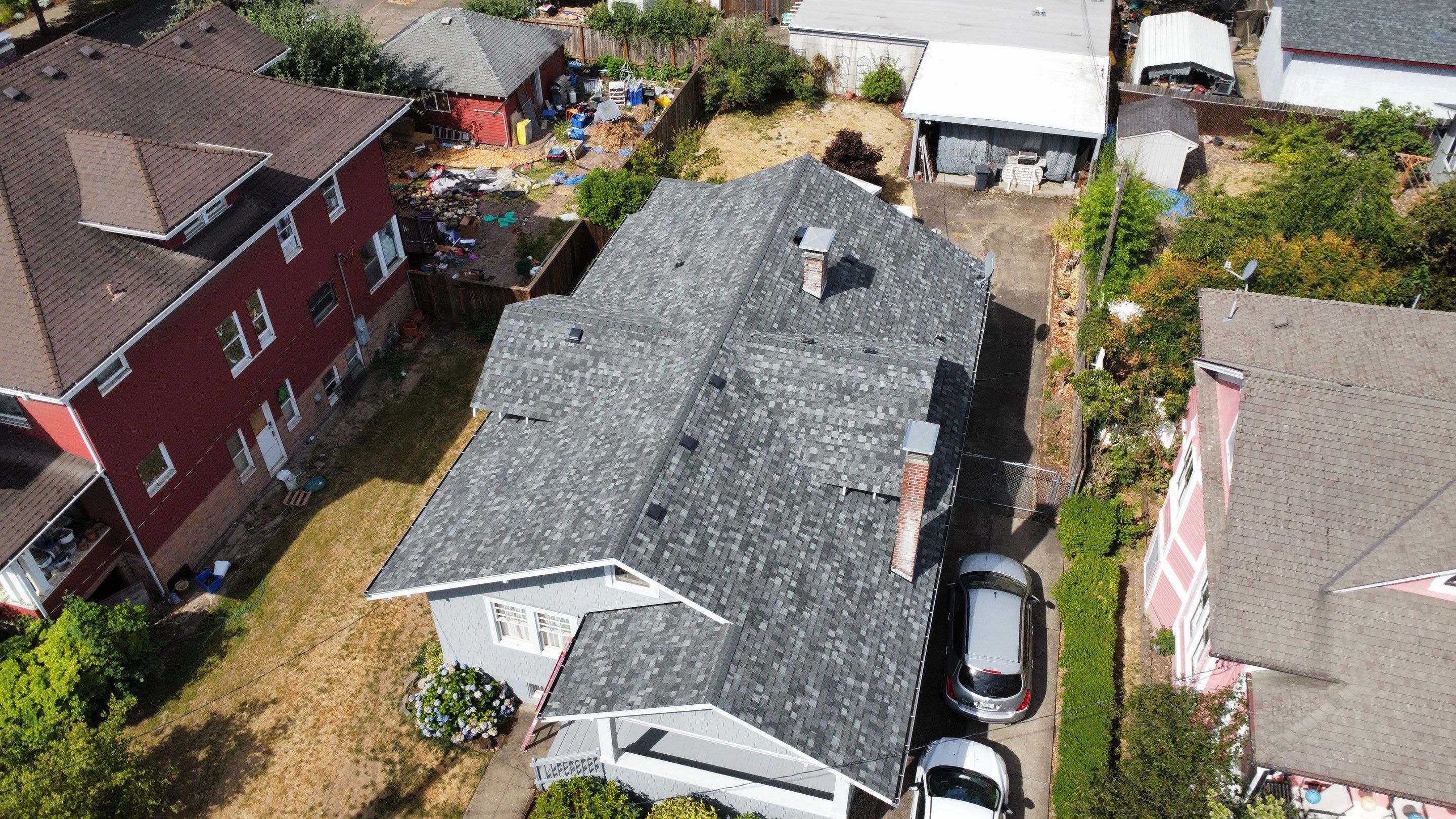 Residential Roofing Installation using IKO Dynasty (Color: Summit Grey) by Orezona Building & Roofing Company, Inc.
