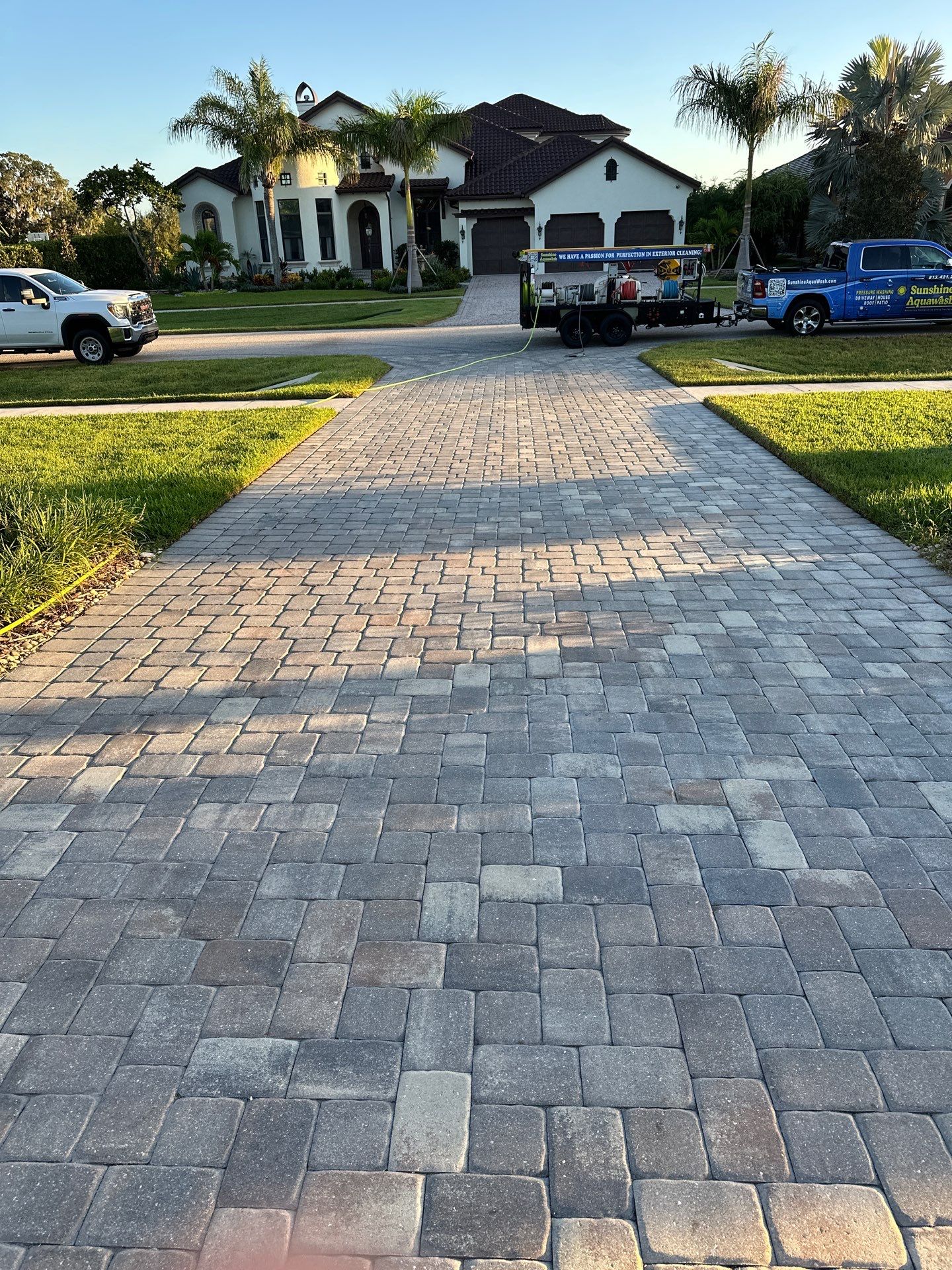 Paver Driveway, Sidewalk, and Pool Deck Cleaning in Winding River Community, Bradenton, FL by Sunshine AquaWash