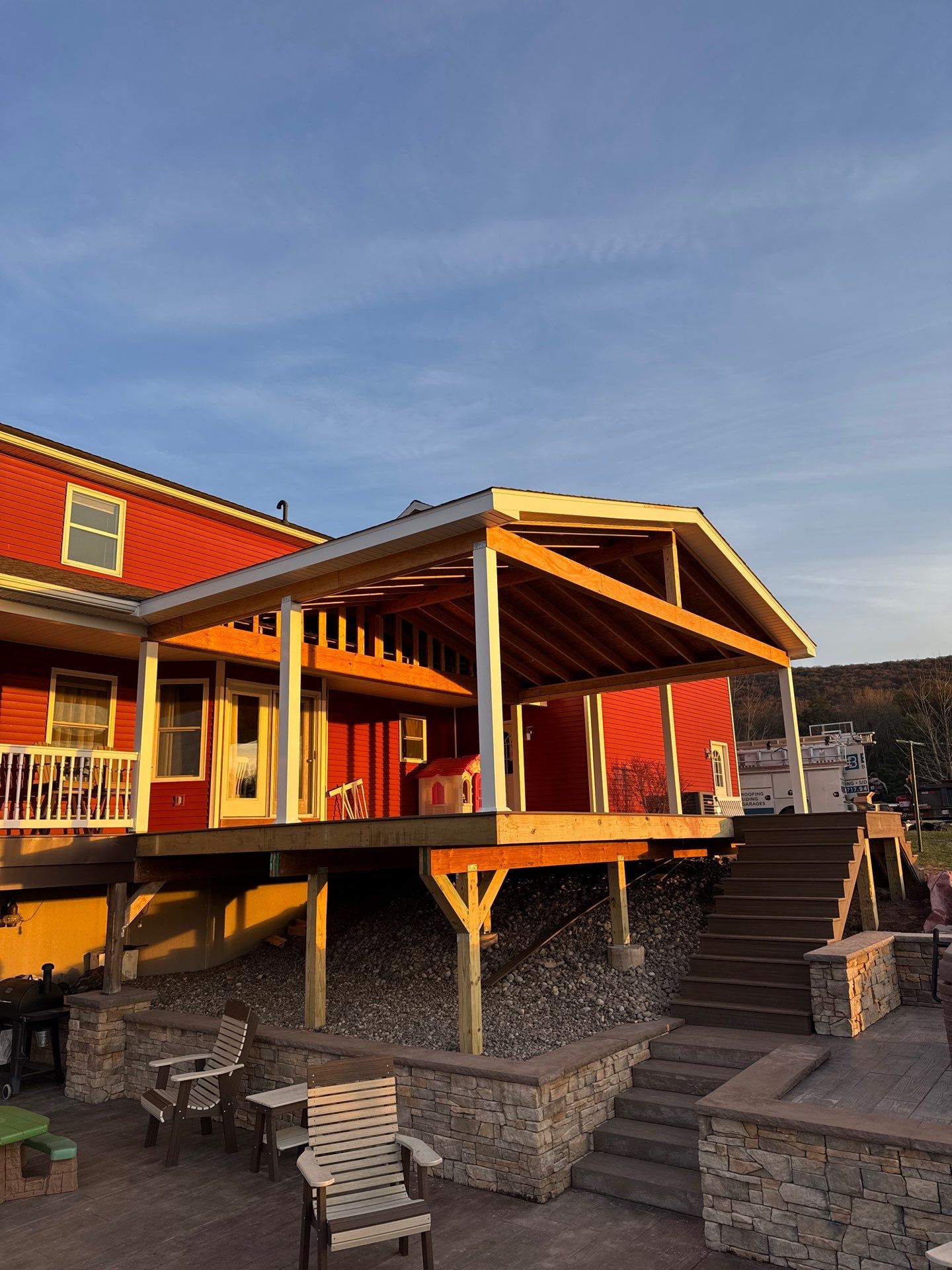 Covered Deck Addition With Custom Gable Roof in Tower City by Esh Builders