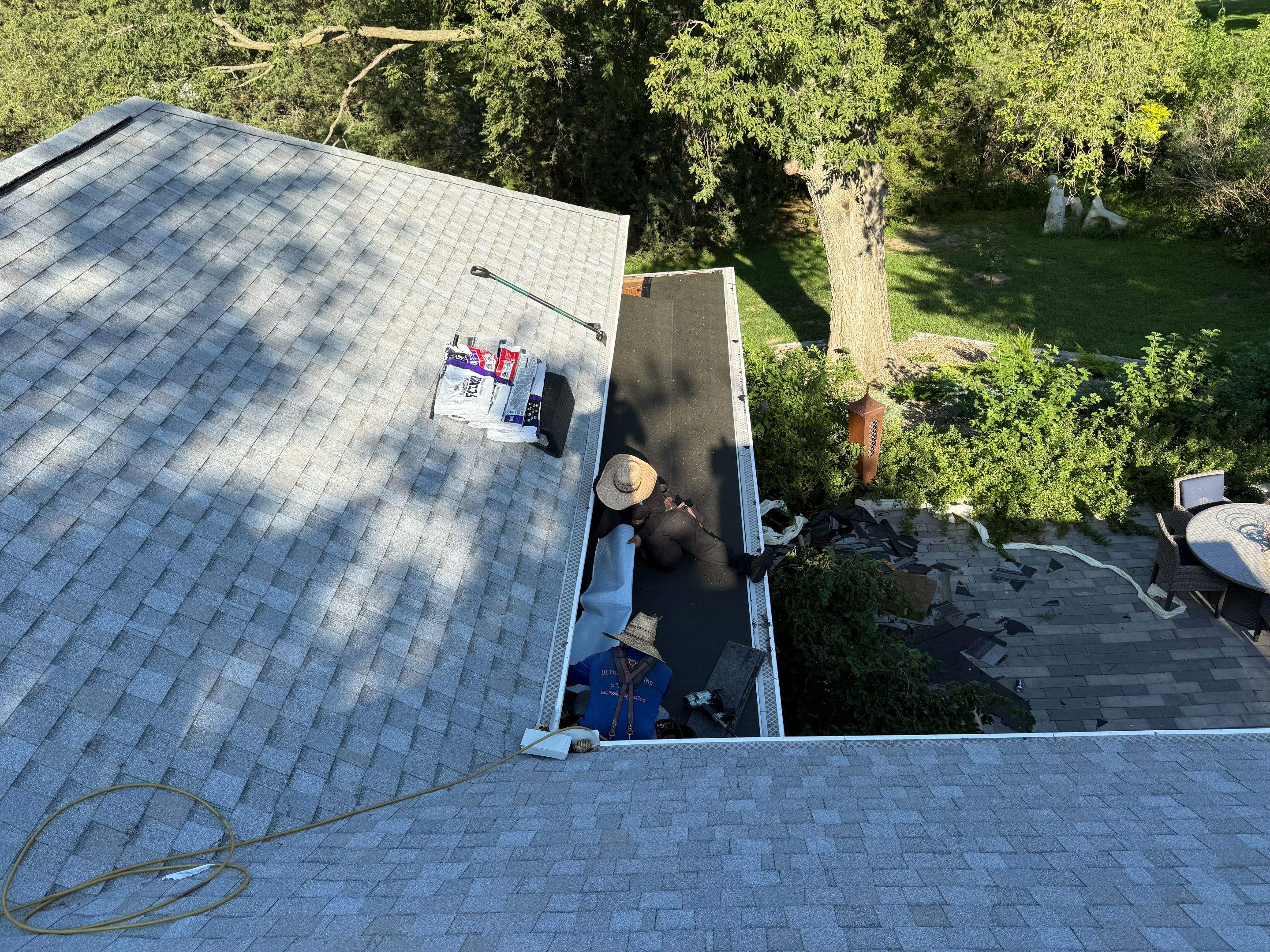 Asphalt Shingle and EPDM Membrane Roof Installation in Mineola by Star Home