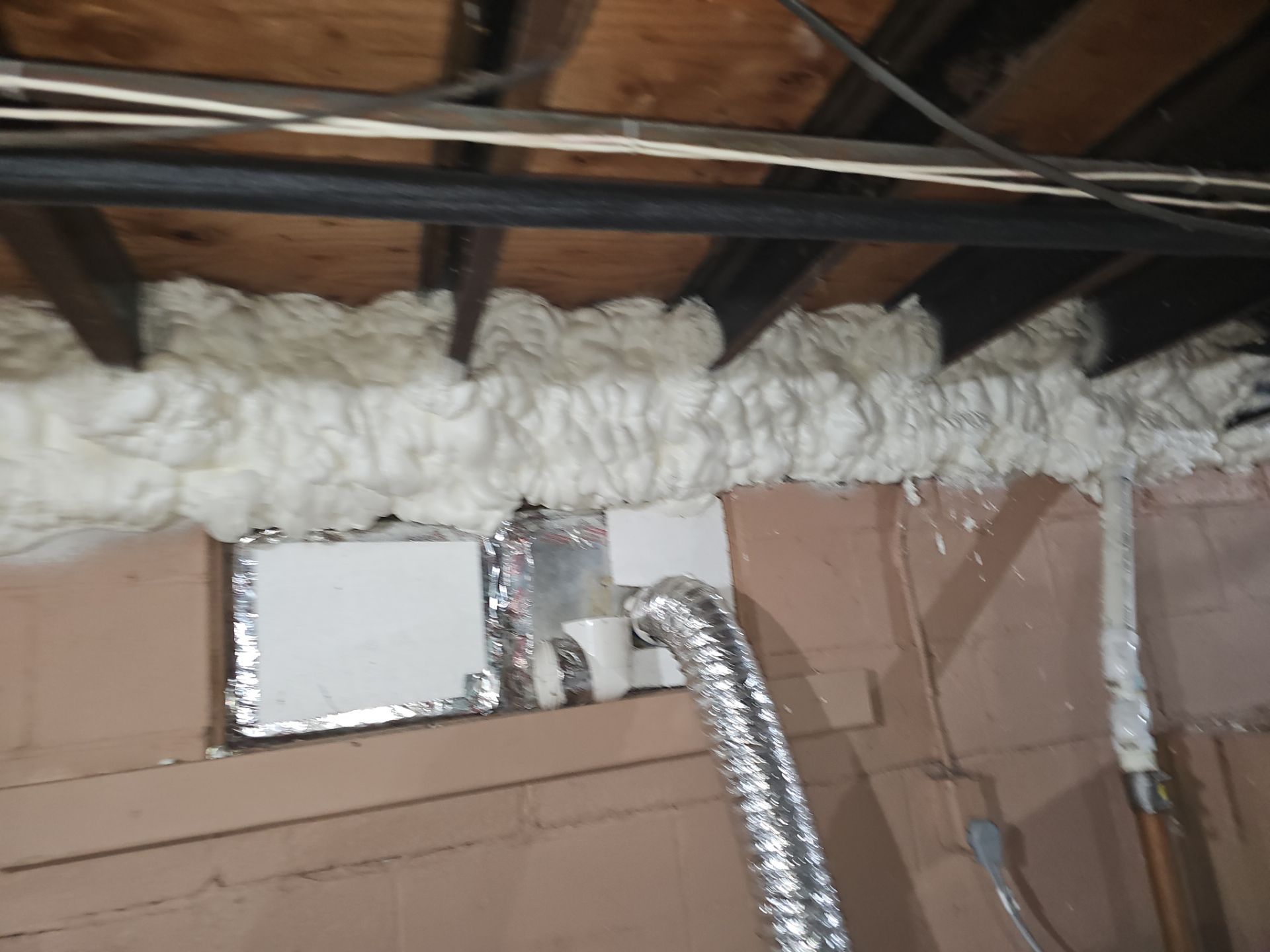 Attic Insulation using open cell spray foam by NYS Foam & Energy
