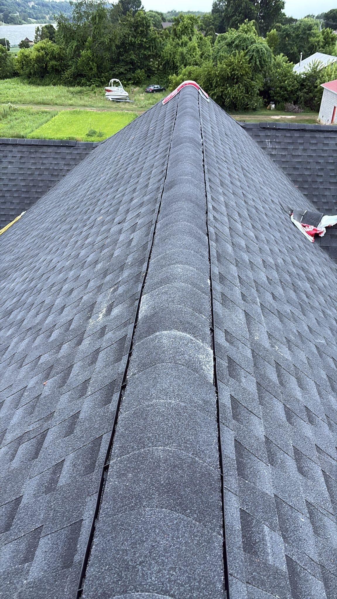 Residential Roofing Installation using GAF Timberline HDZ Charcoal by Rainstoppers Roofing