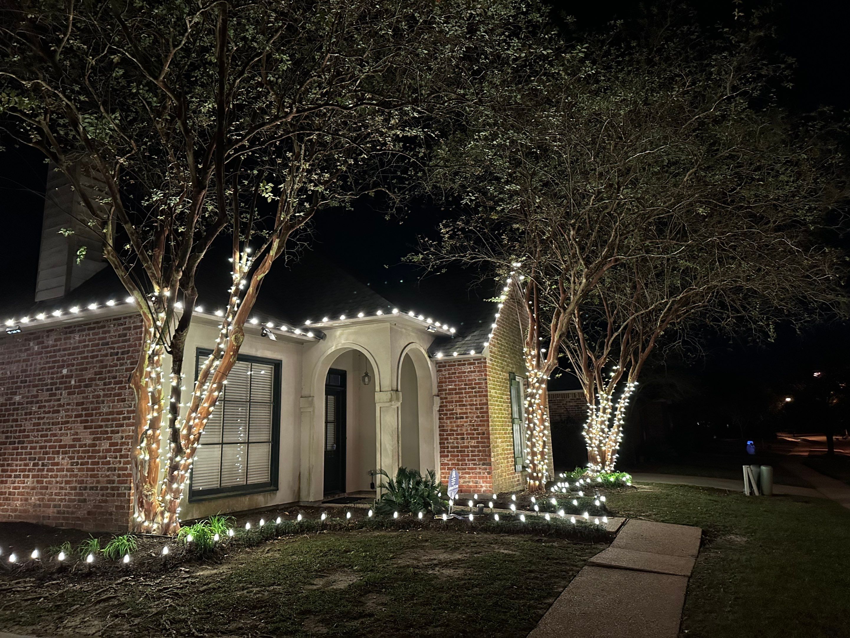 WINTER SERVICES: HOLIDAY LIGHTING using ROOFLINE PERIMETER LIGHTING: HALLOWEEN THEME WITH ORANGE AND PURPLE BULBS by CutScape, LLC.