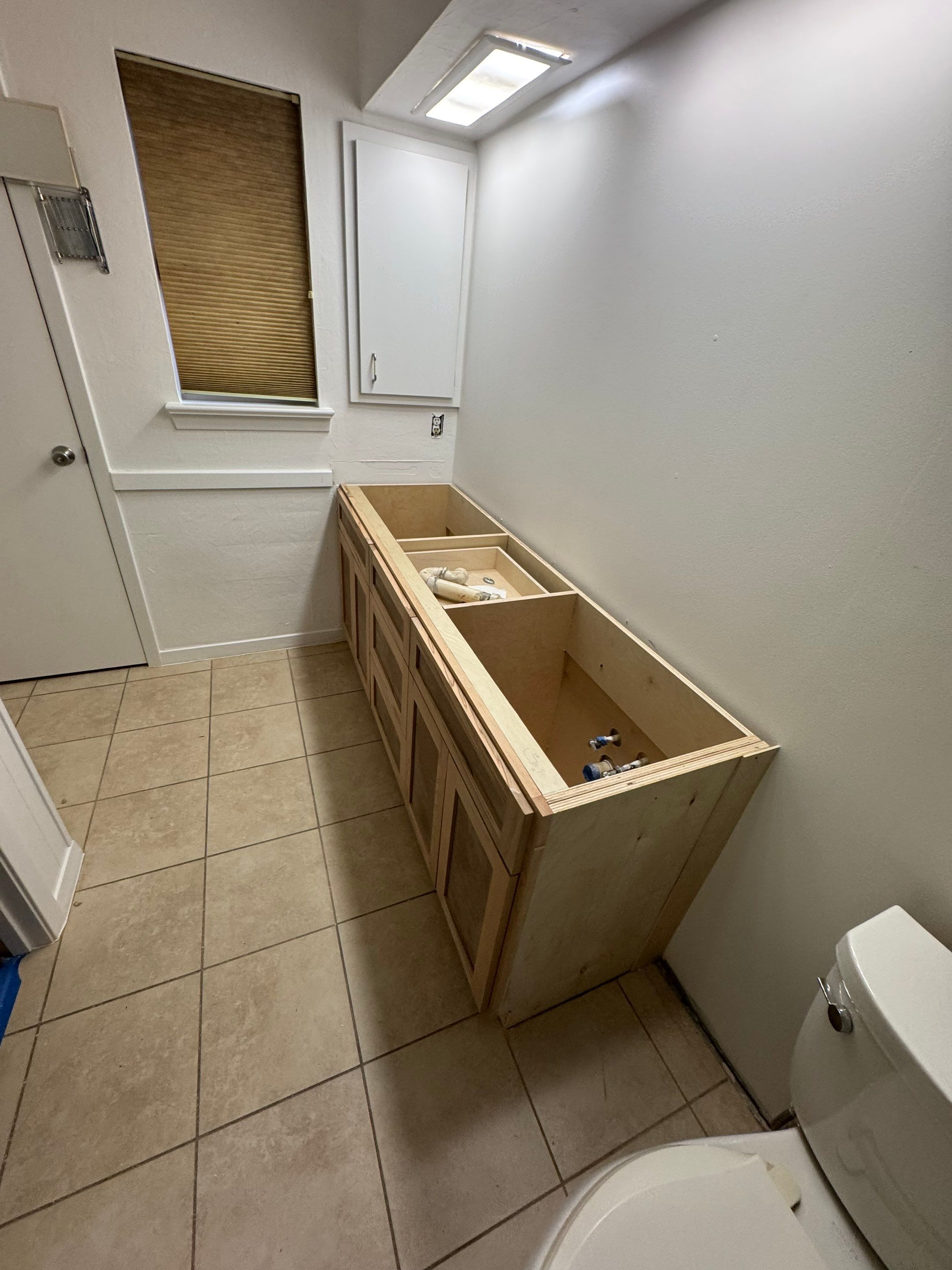 Reconstruction of bathroom after mold remediation by SLM General Contractors & Roofing