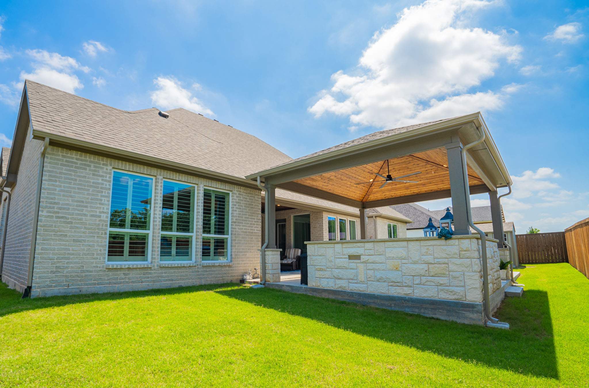 Backyard Hub: Structure & Style by Complete Exterior Solutions