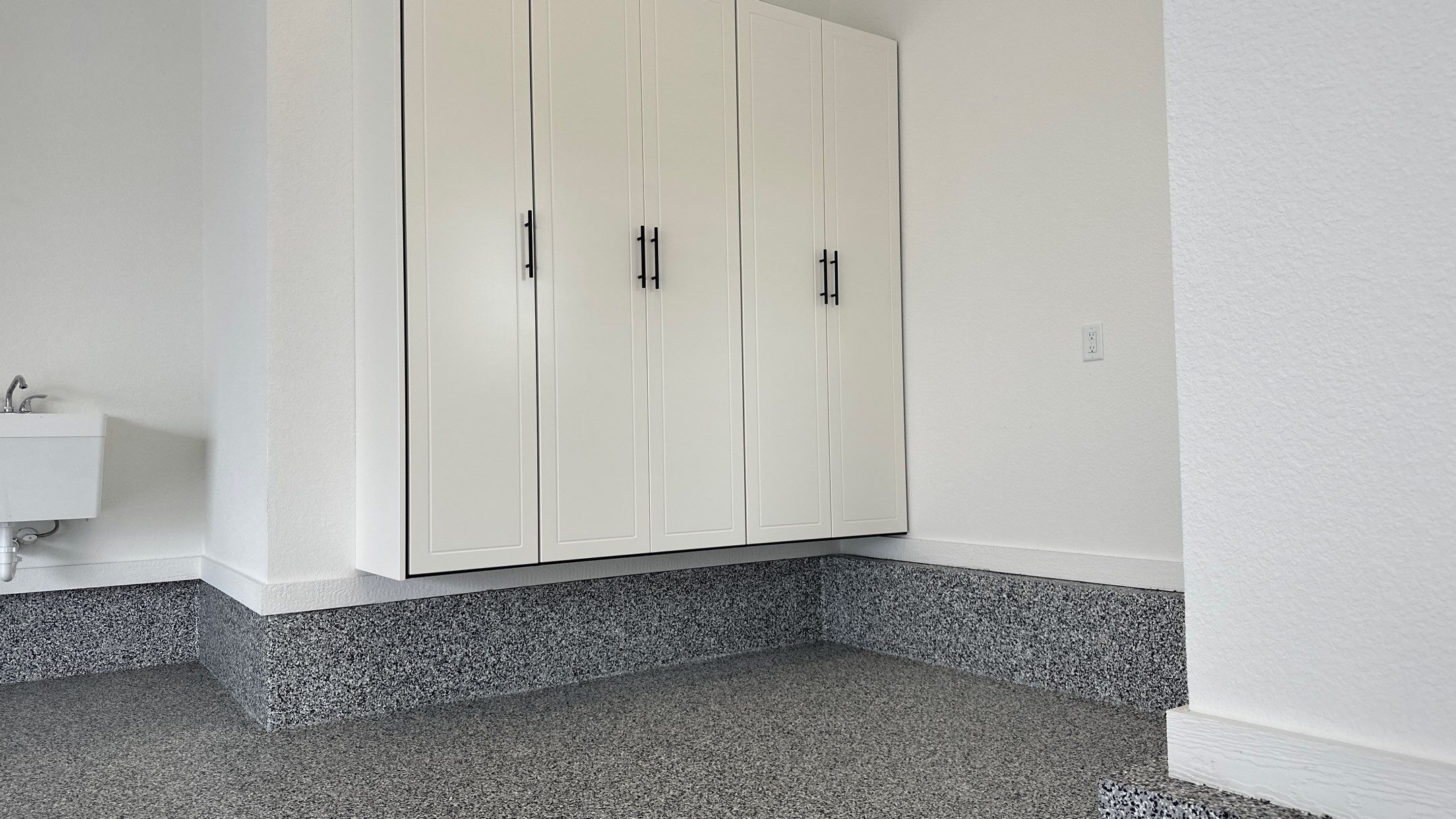 Mike & Pam transformed their garage with a Banner Garage Floor and Cabinets by Banner Garage