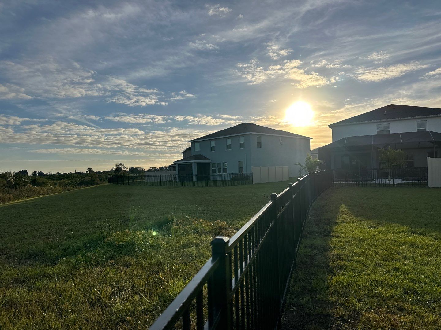 Vinyl Fence Installation using Vinyl Fence and a Black 3 Rail Aluminum Fence by Asap fence and gates, LLC