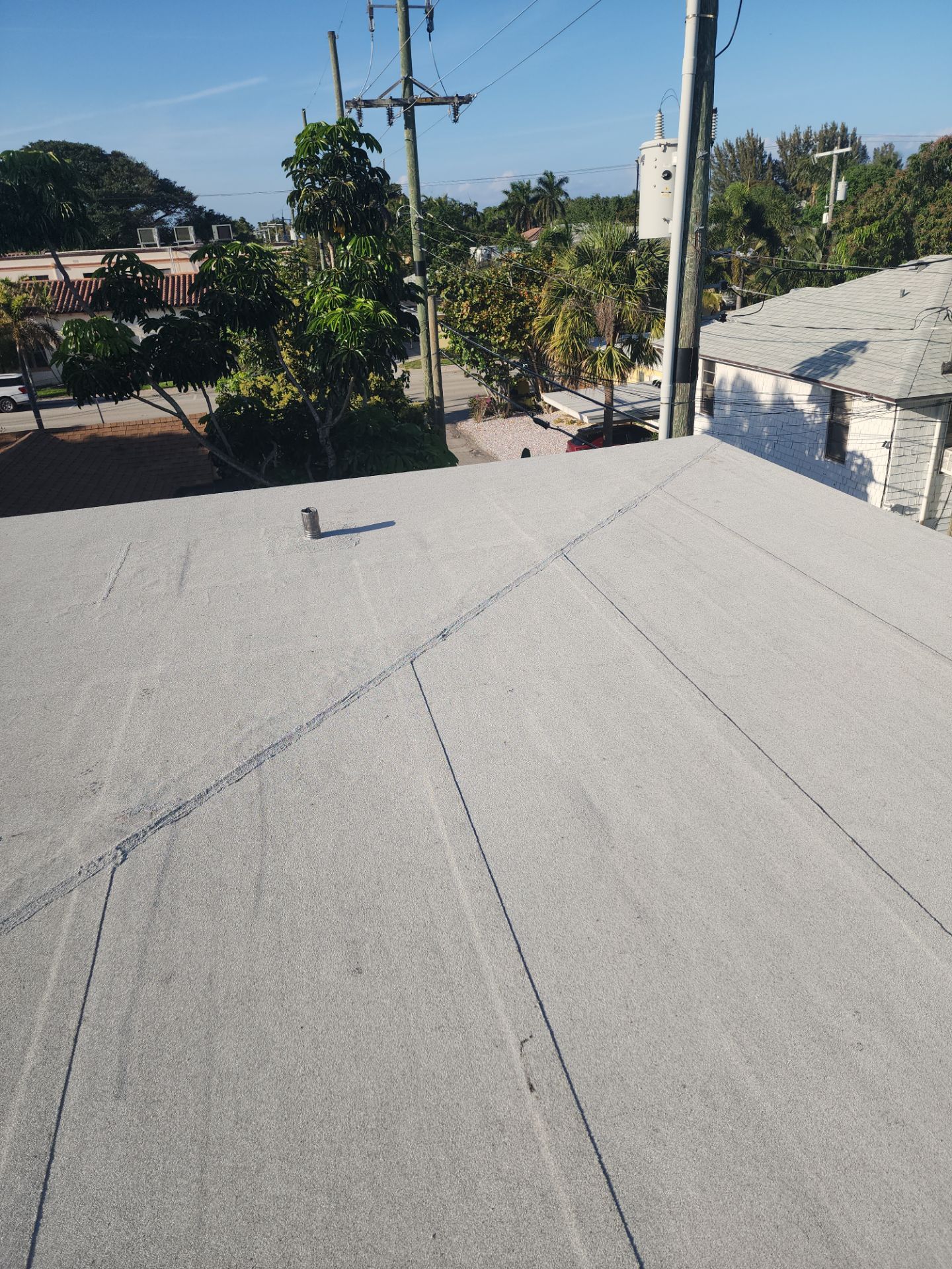 Flat Roof Replacement and Insulation Upgrade in Lake Worth Beach by Aastro Roofing