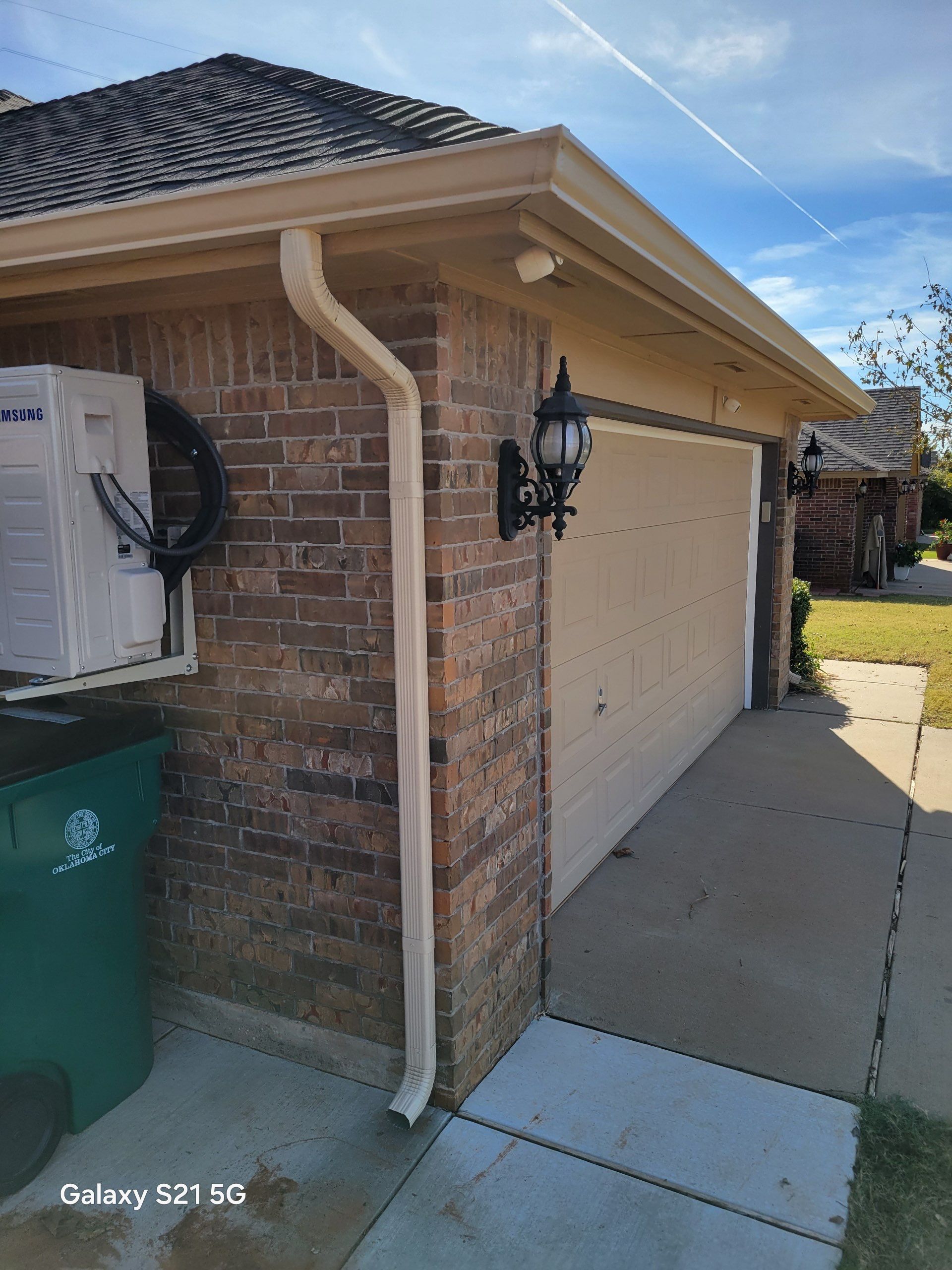 roof replacement & gutter installation in Edmond by McCann's Roofing and Construction