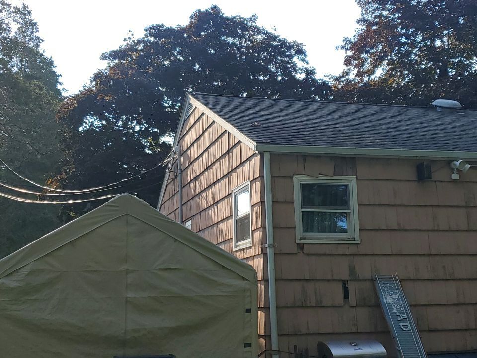Siding Installation using Certainteed Mainstreet Forest Green by A Plus Exterior
