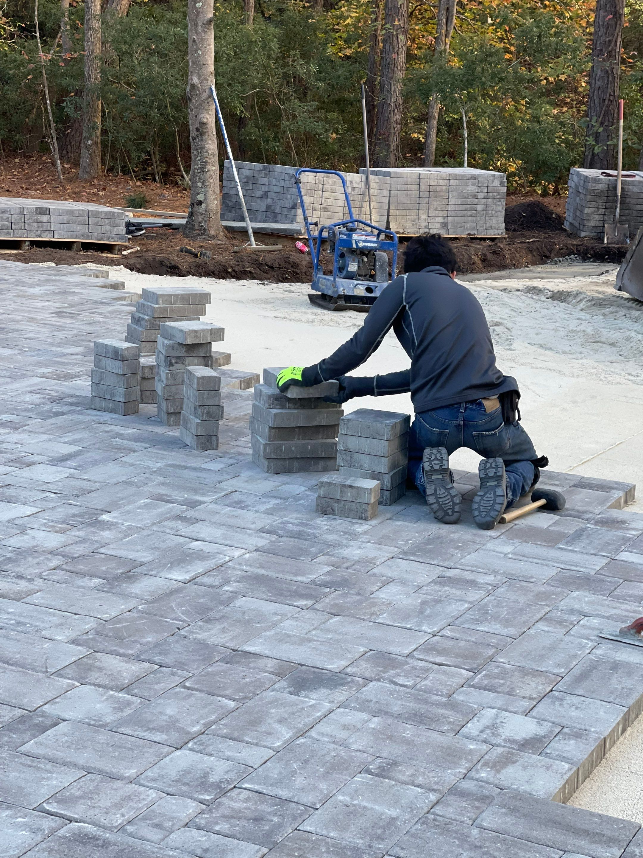 Custom Paver Driveway and Textured Pool Deck Installation in Hilton Head Island by Lowcountry Scapes, LLC