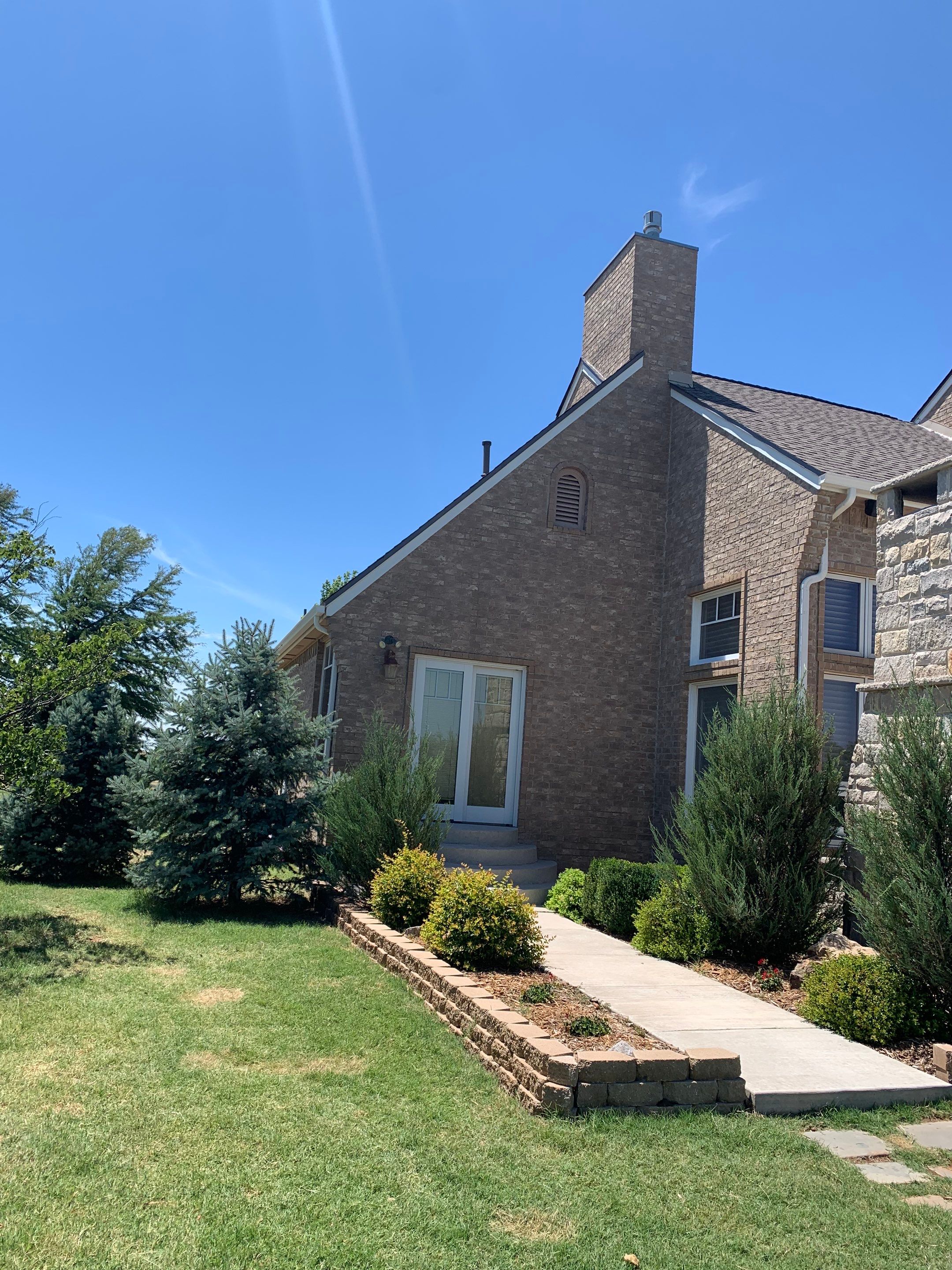 Roof Replacement and Gutter Installation in Edmond, OK by McCann's Roofing and Construction