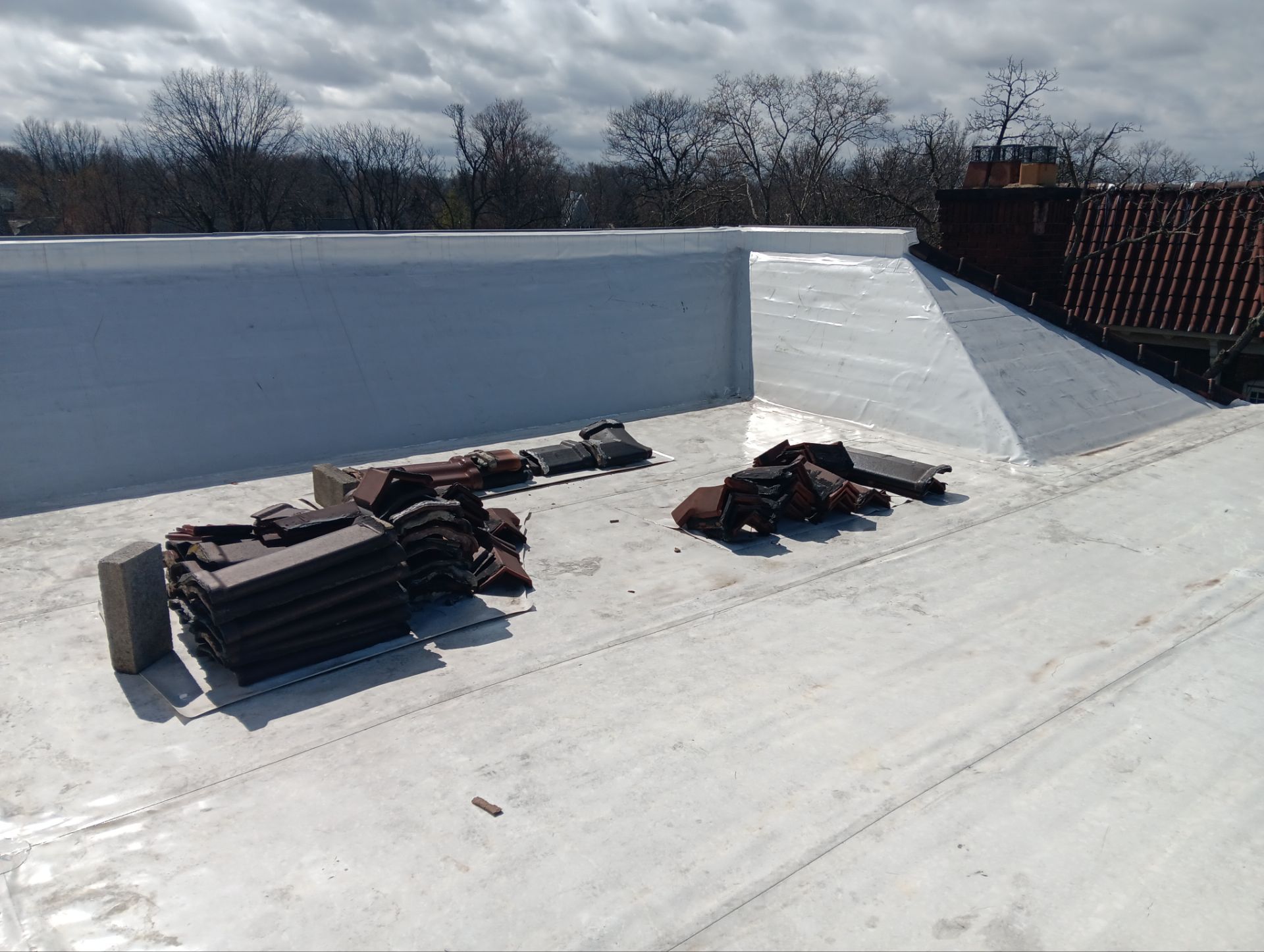 Commercial Roofing Installation using Duro-Last 50 mil PVC by 3 Daughters Construction 