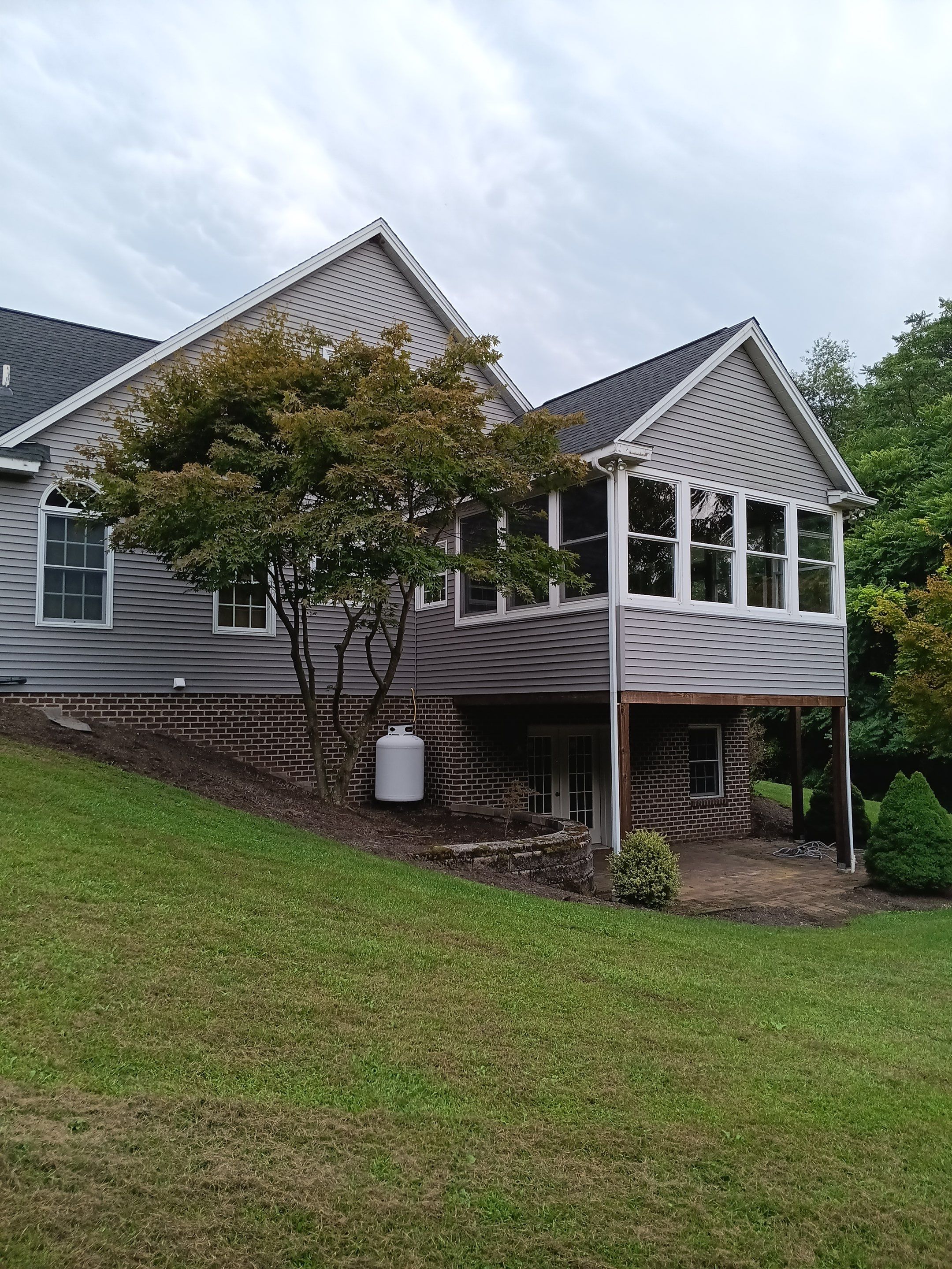 Full Vinyl Siding Replacement and Shingle Roof Install in Millersburg by Esh Builders