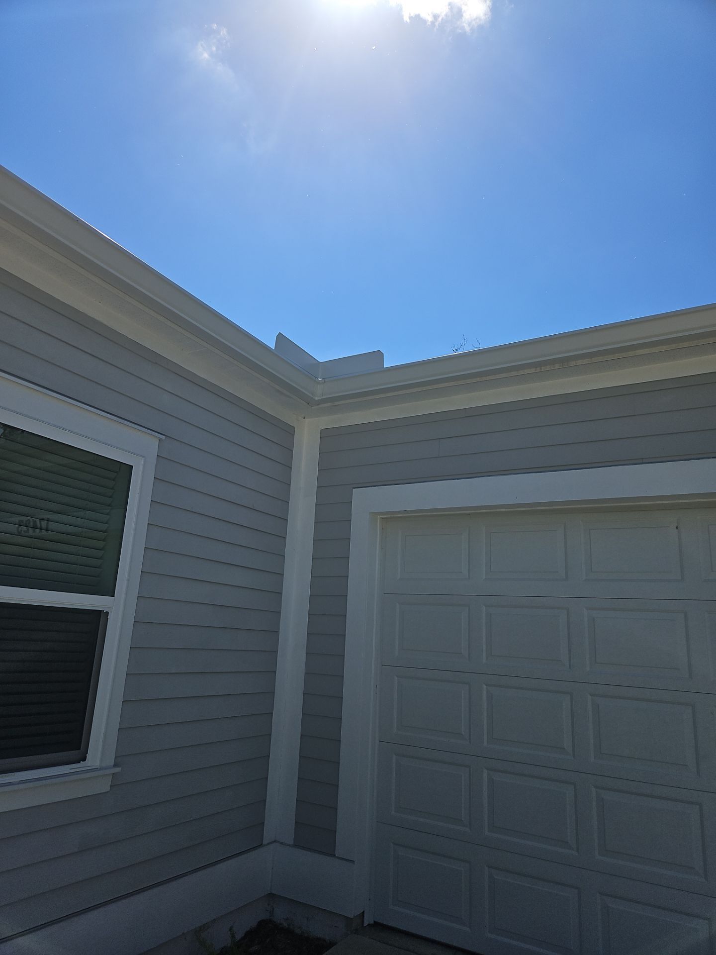 Downspout Installation using 3X4 Elbow Downspout in Port Charlotte FL by Gutter Professors