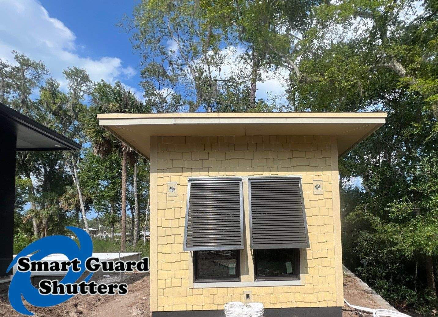 Decorative Shutters in Umbra Grey by Smart Guard Shutters