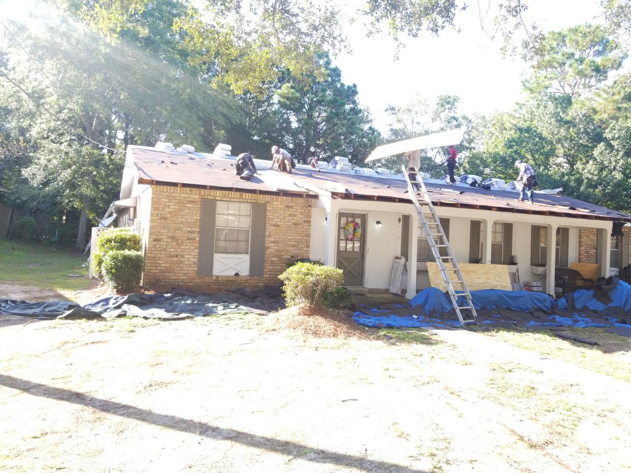 Residential Roofing Installation using Roof Replacement by American Roofing & Construction LLC
