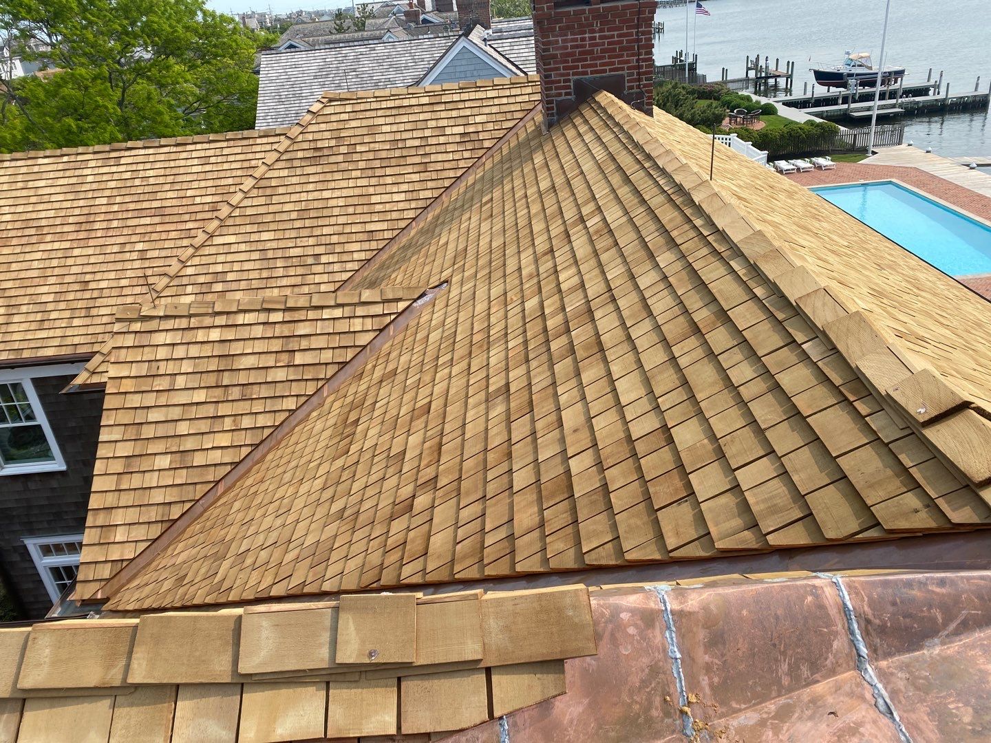 Residential Roofing Installation using Cedar Shakes by CMNG LLC