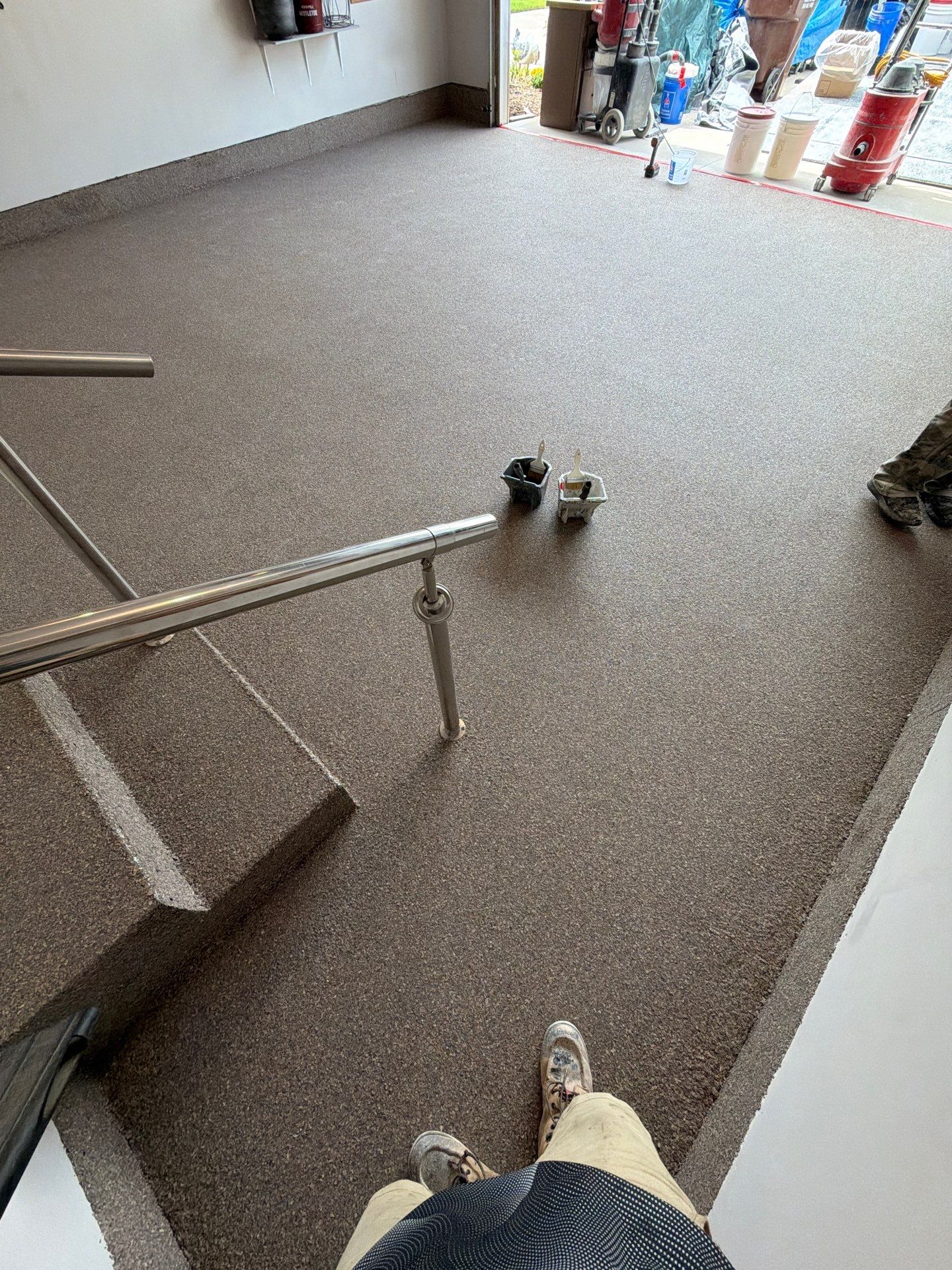 Garnet Polyaspartic Flake Garage Floor Installation in Zeeland by Gordon Painting