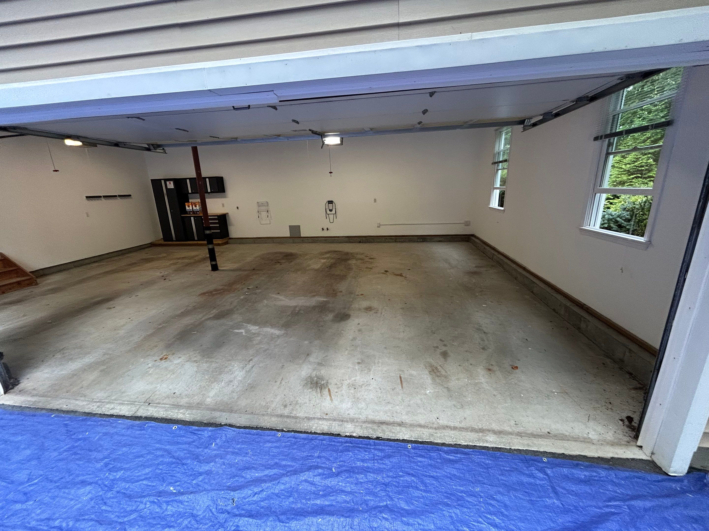 Wombat Concrete Floor Coating Transformation by DiGiorgi Roofing and Siding Inc