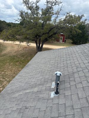 Architectural asphalt shingle roof with a plumbing vent.